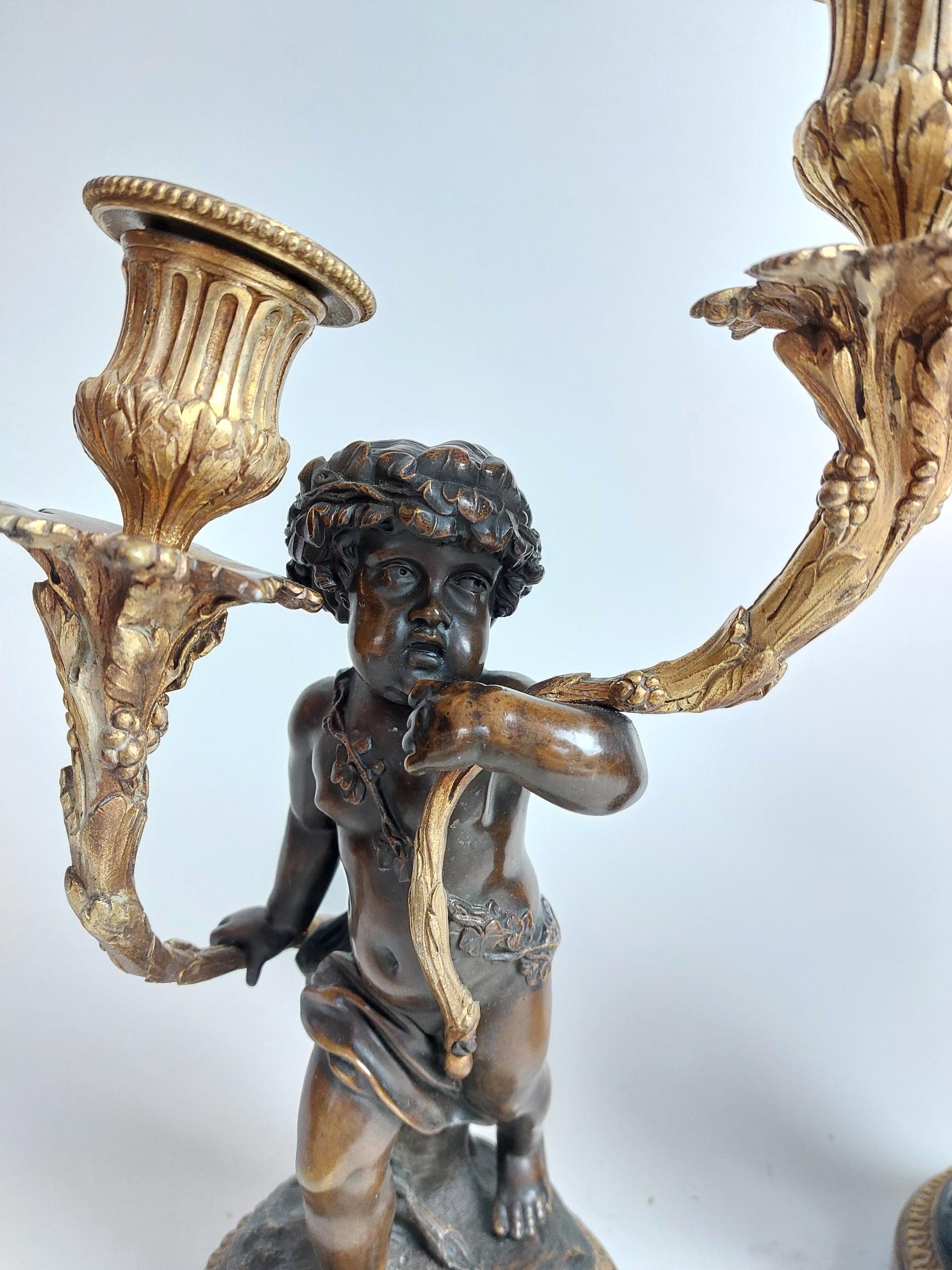 Regency Revival Pair of 19th Century Ormolu Candlestick Holders Held by Bronze Fawns/Cherubs For Sale