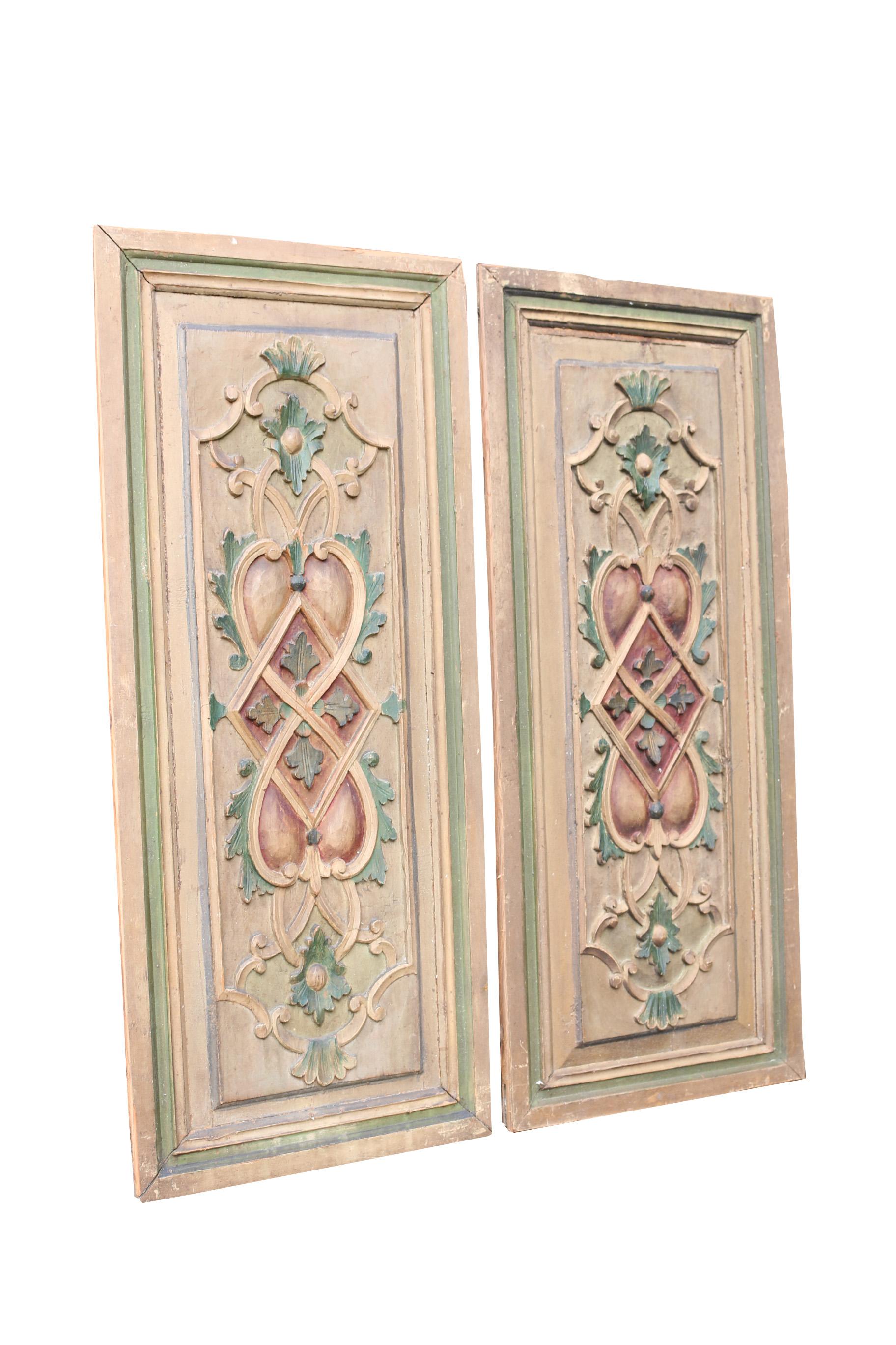 These hand carved panels feature original paint. Additional Dimensions: Width 43.5 cm & 44 cm Weight 4 kg each.