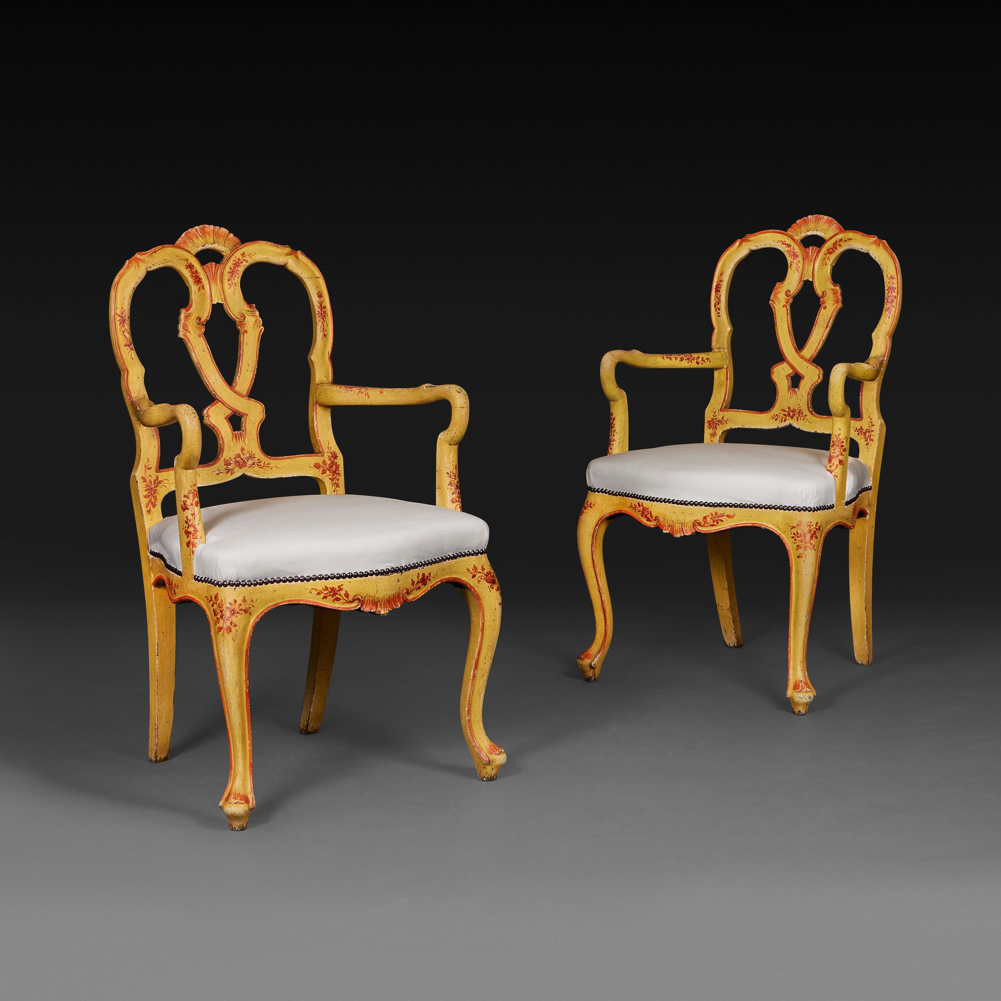 Italy, circa 1880

An unusual pair of late nineteenth century Venetian armchairs, the frames painted with yellow surface throughout, with red detailing, the back splat with intertwined knot to the centre and carved fan motif to the top. Now