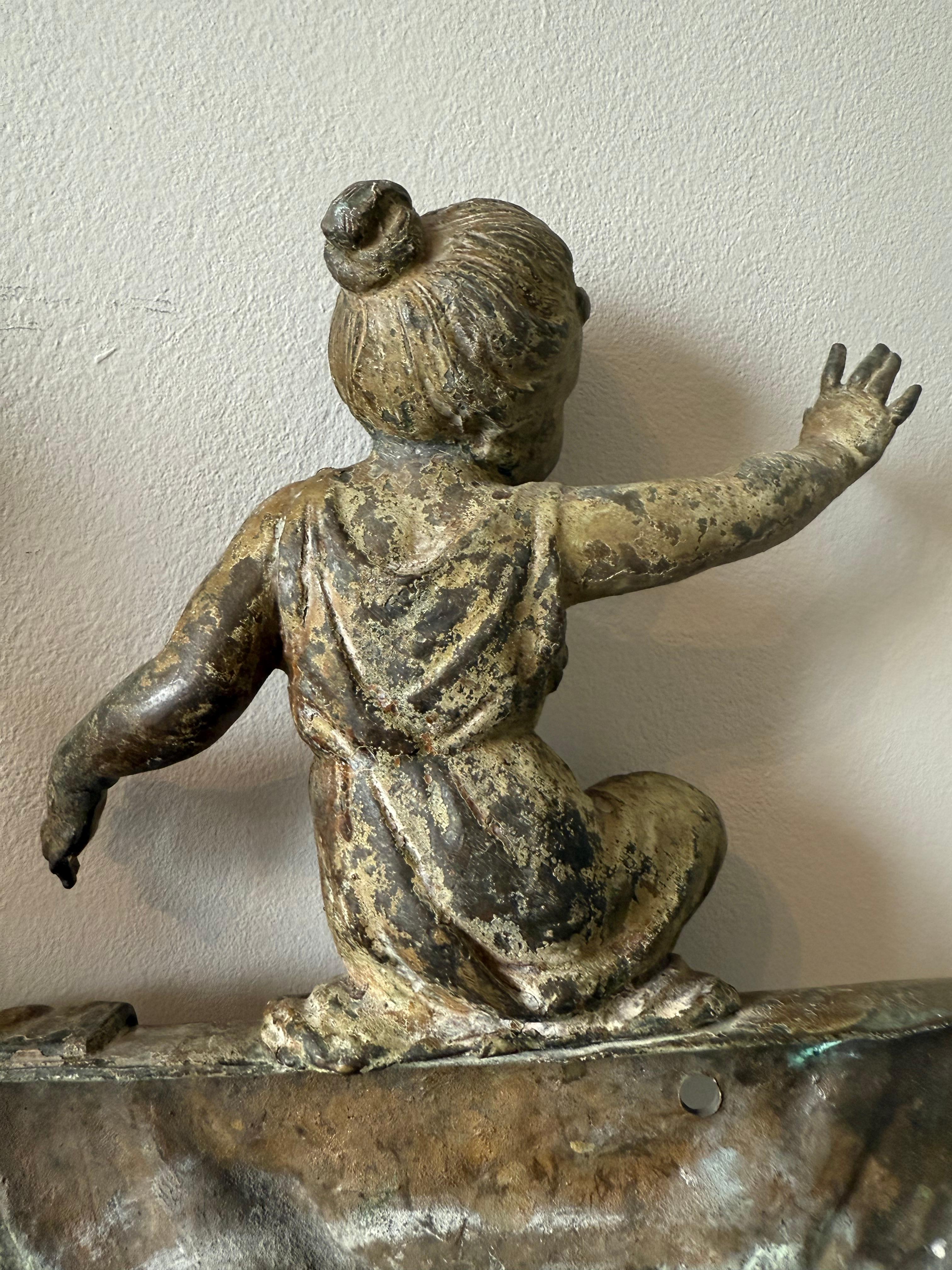 Paire de putti français patinés du 19ème siècle en vente 5