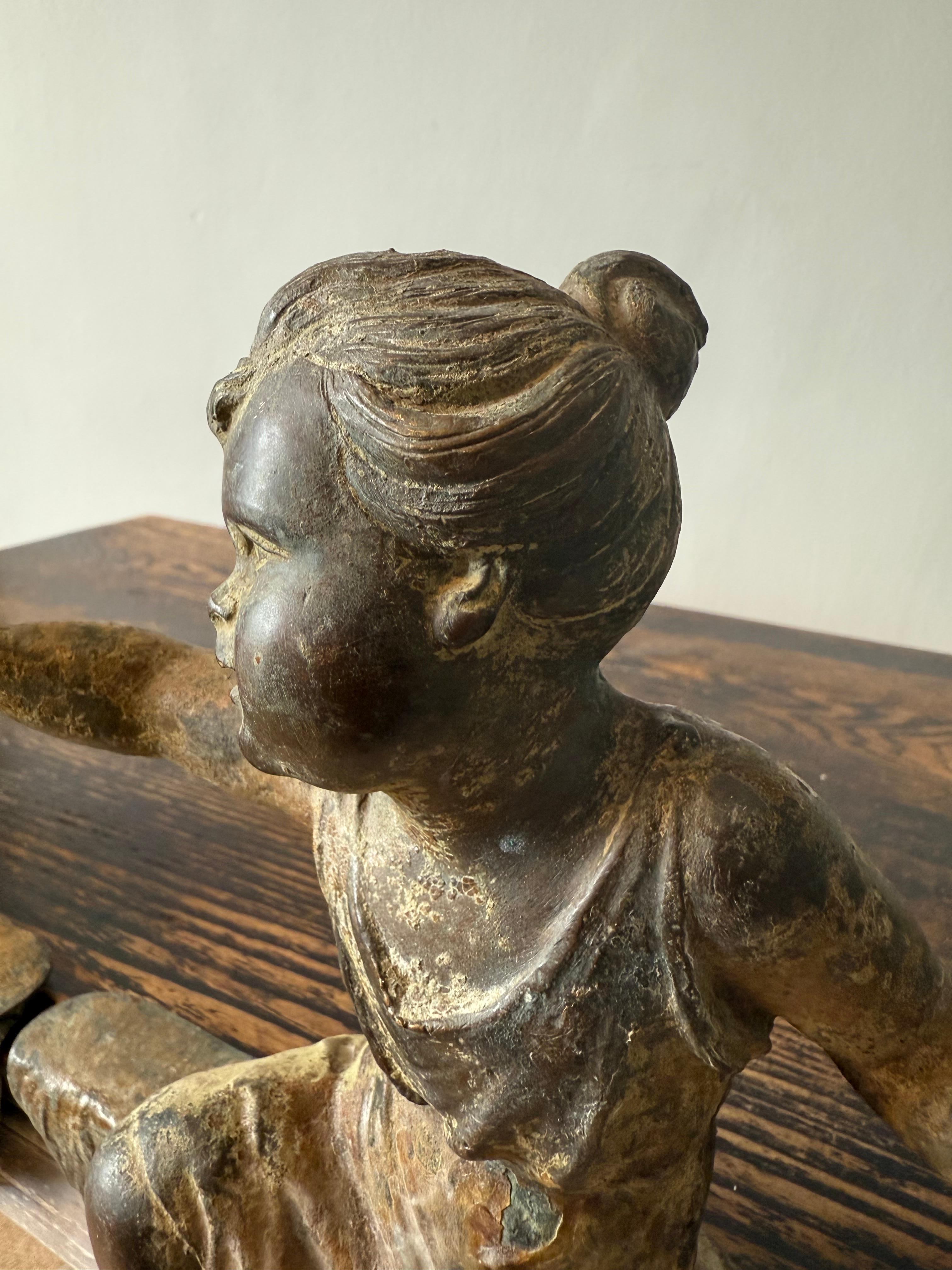 Paire de putti français patinés du 19ème siècle en vente 6