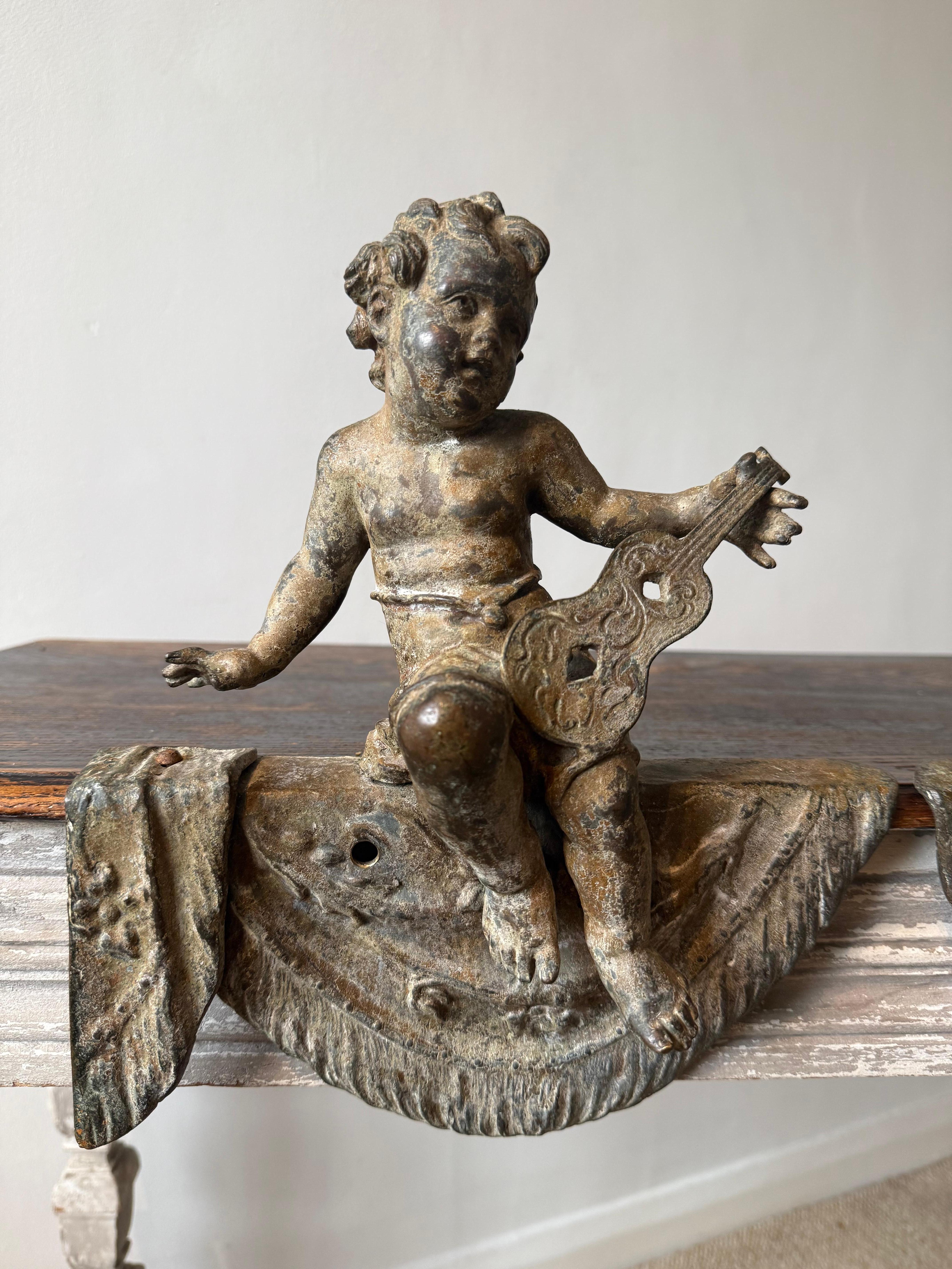 Fait main Paire de putti français patinés du 19ème siècle en vente