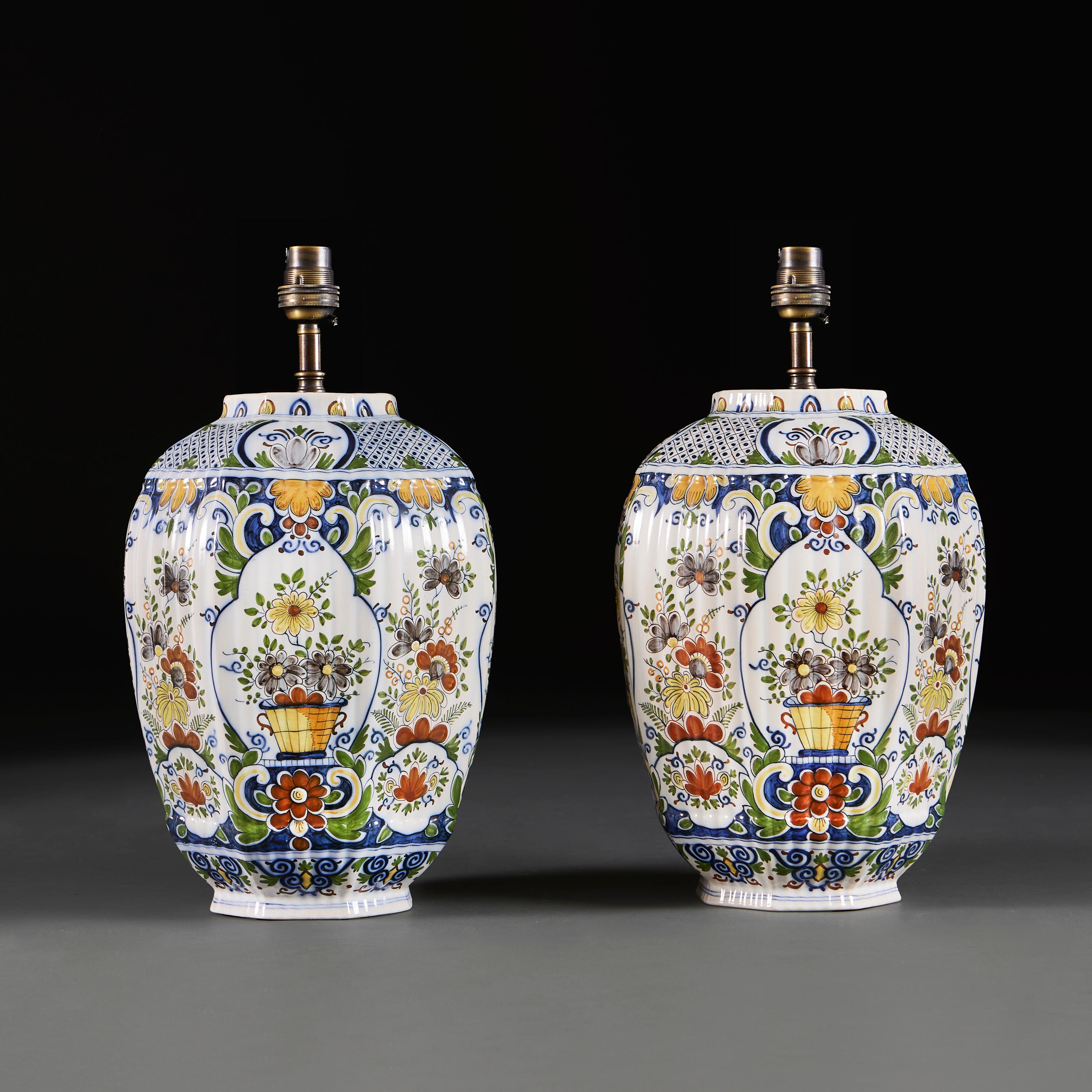 Danish A pair of 19th century polychrome delft vases as lamps 