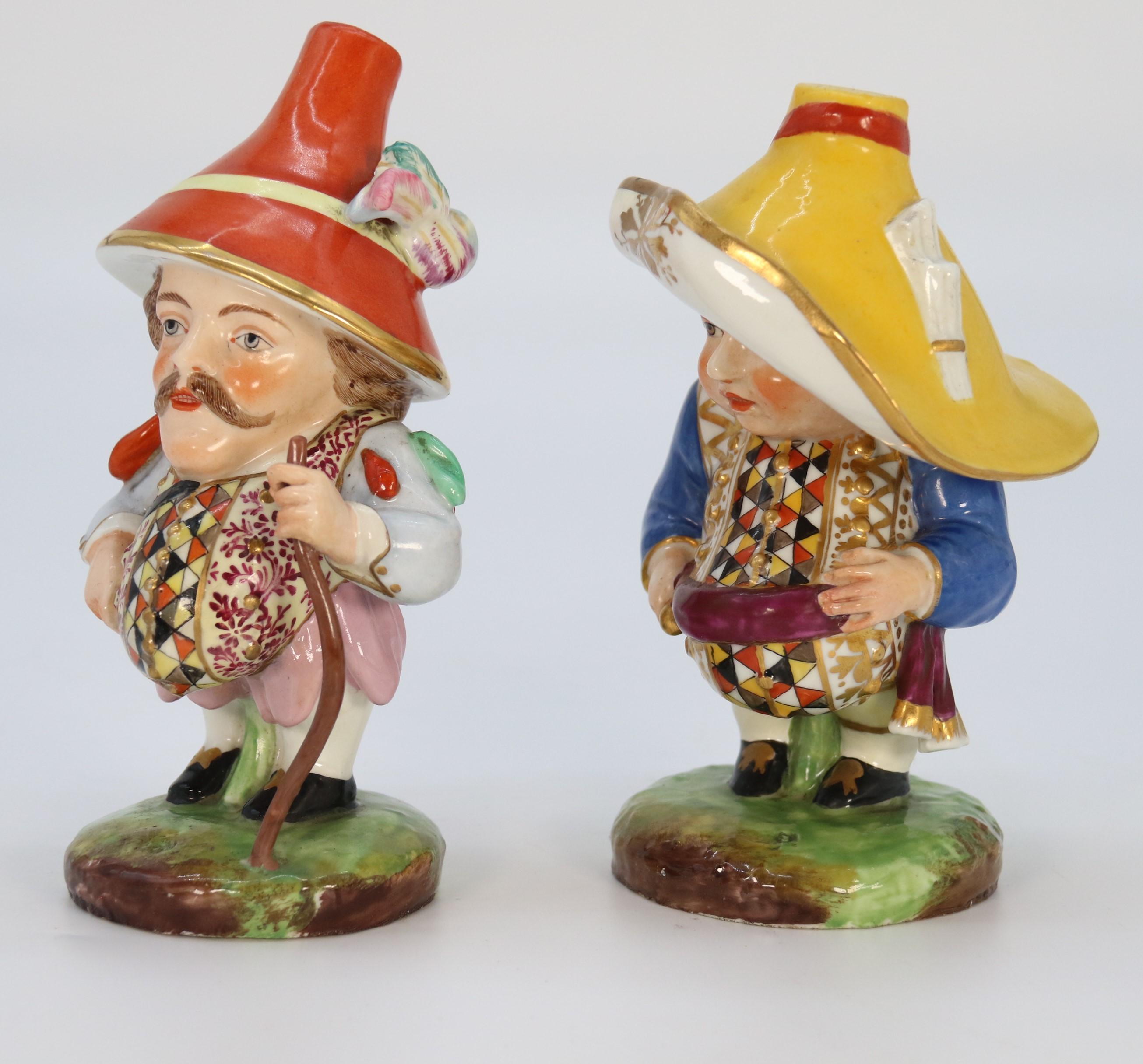 
This superb large and highly decorative pair of 19th century Mansion House dwarfs are in the style of early Derby examples reproduced by the famous French Paris factory Samson who was well known fakers and imitator of famous high end factories and