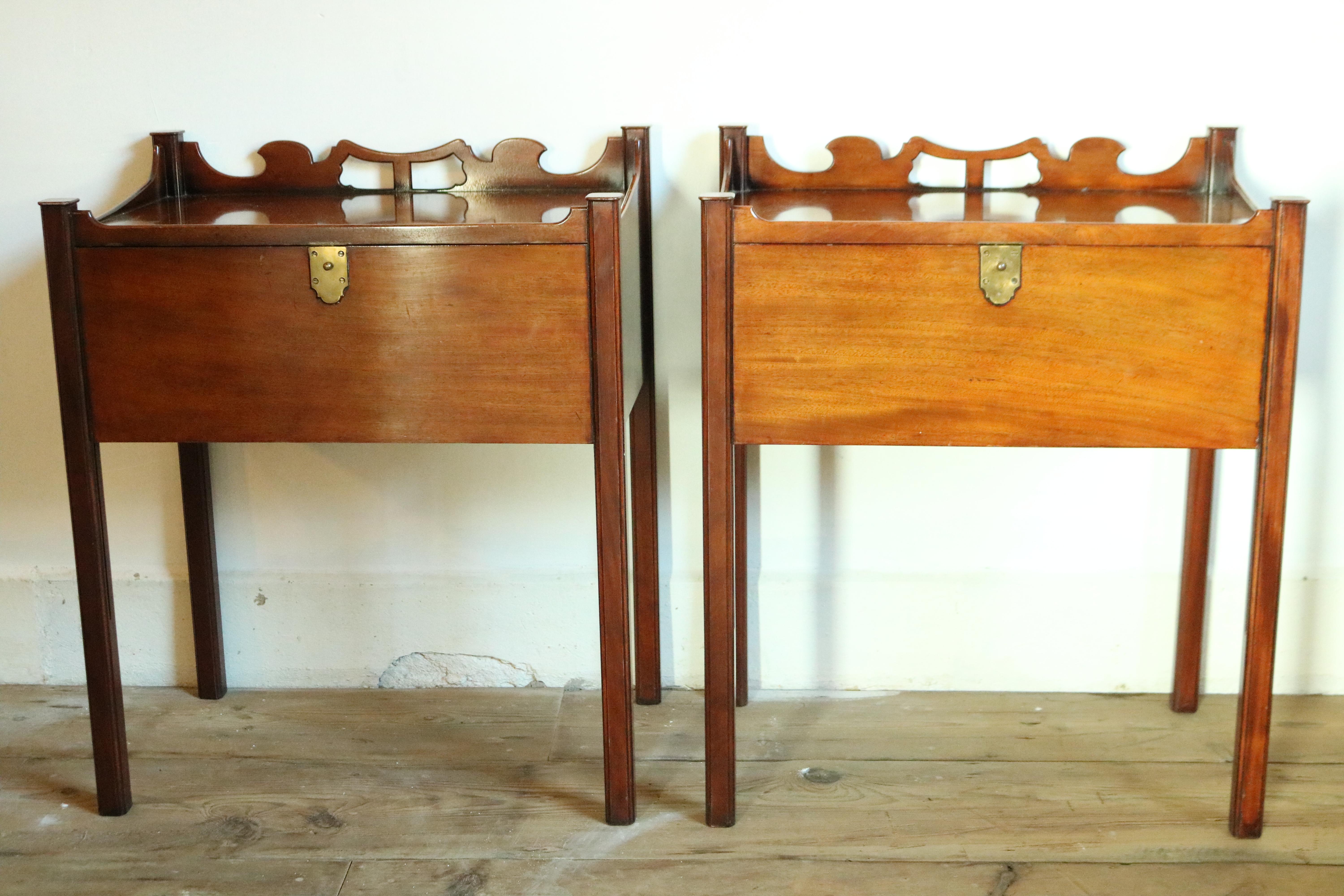 A pair of very smart 19th century mahogany pot-cupboards in the manner of Gillow, Each cupboard has drop down front with brass mechanism, Inside are five beautifully constructed draws with very fine dove tail joints, both have a threat work gallery