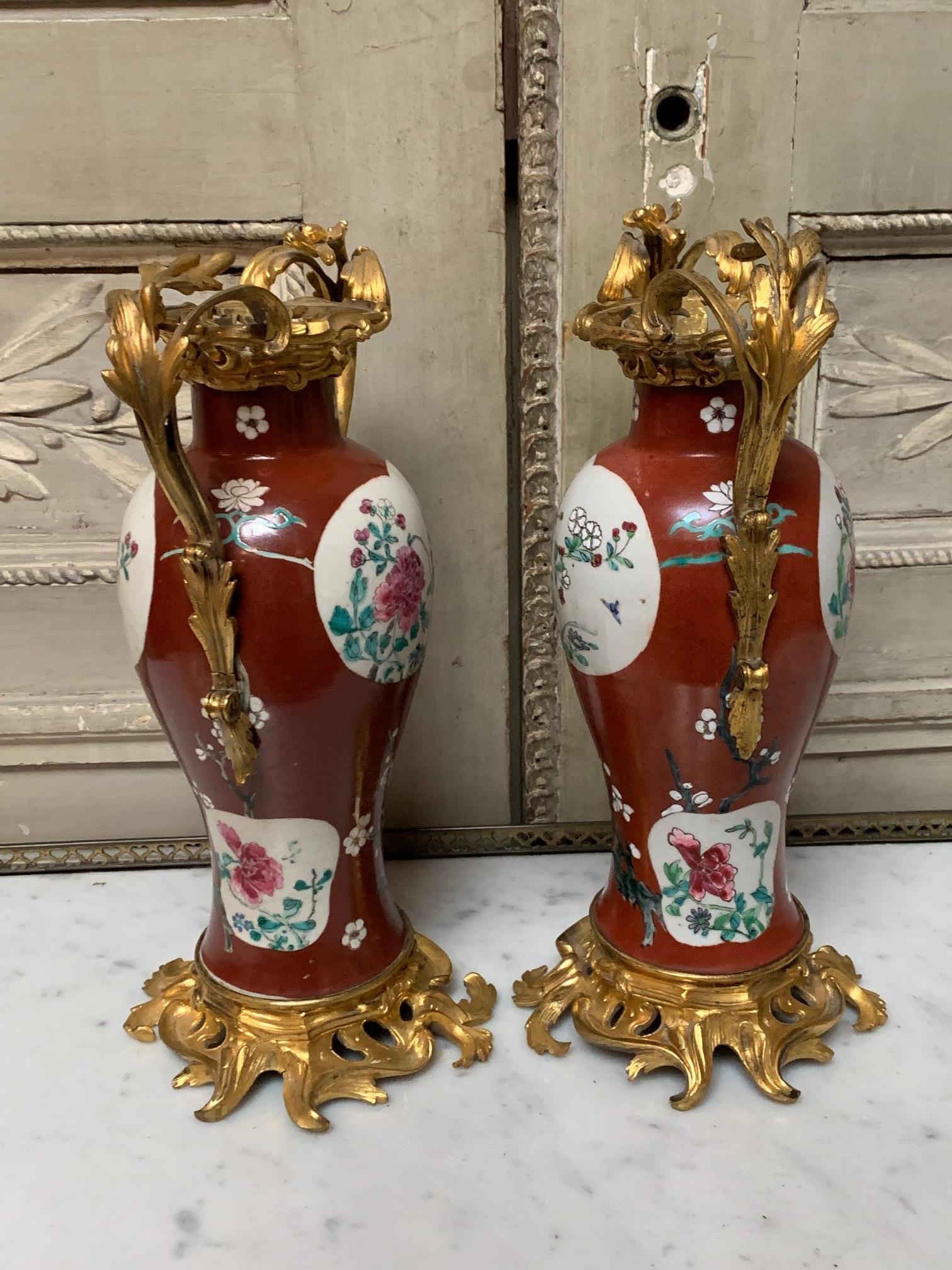 Cast Pair of 19th Century Red Chinese Porcelain Vases with French Bronze Mounts
