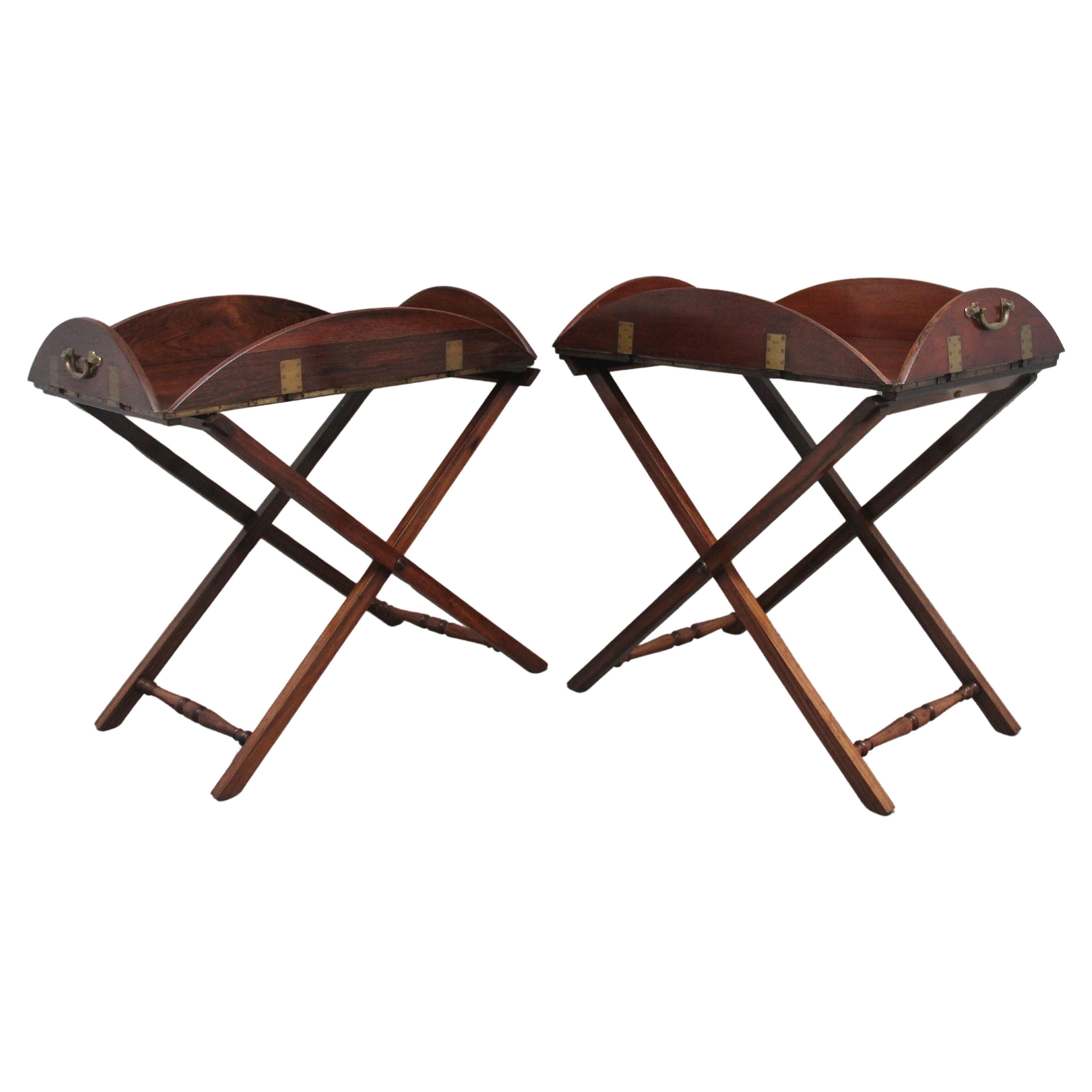 A pair of 19th Century rosewood folding butlers tray on stands