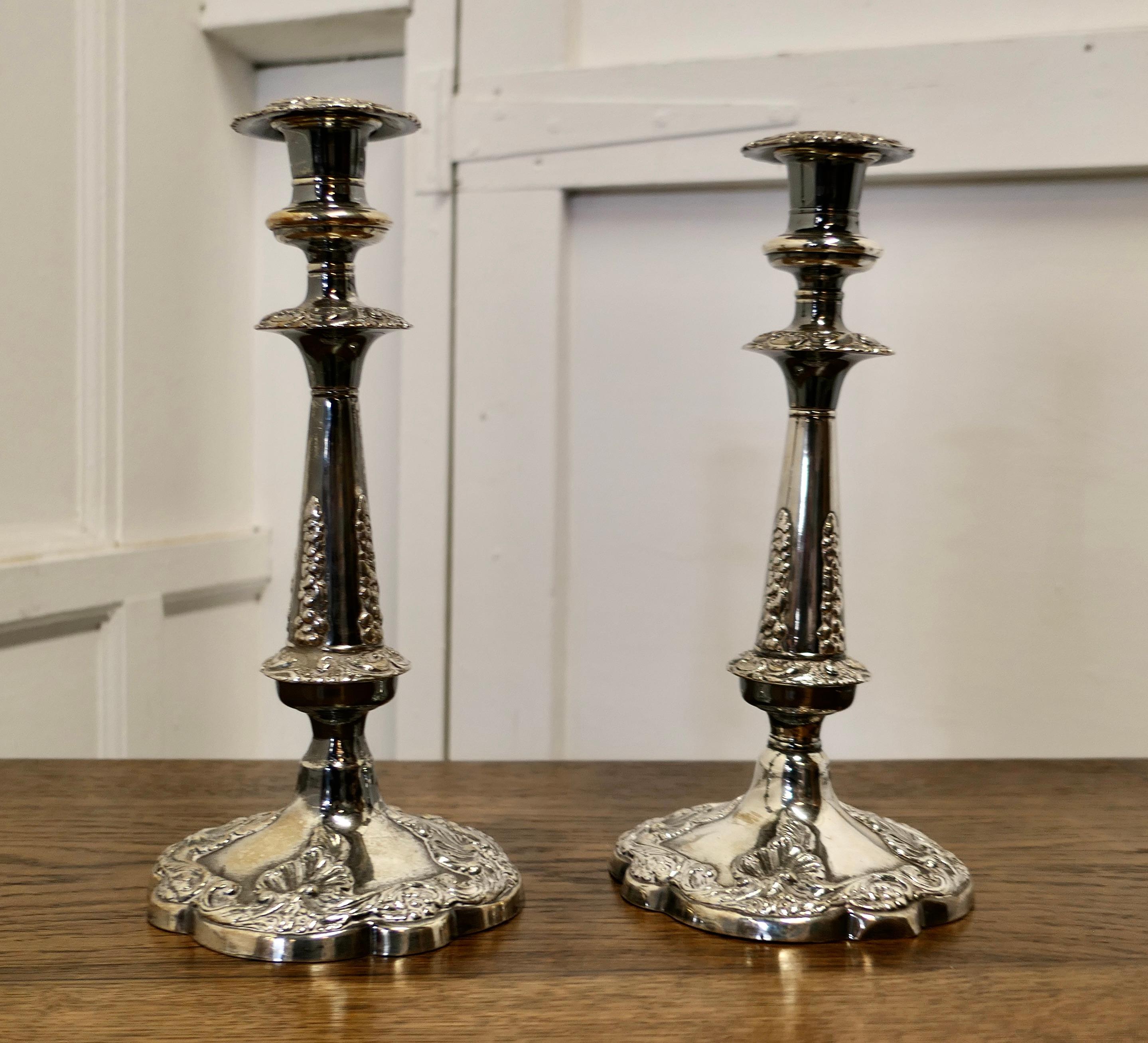 A pair of 19th Century silver plated candle sticks.


The candle sticks are very decorative they have lift-out drip pans and are decorated with shells, scrolls and leaves. 
The candle sticks are in good antique condition, they are well cast, and