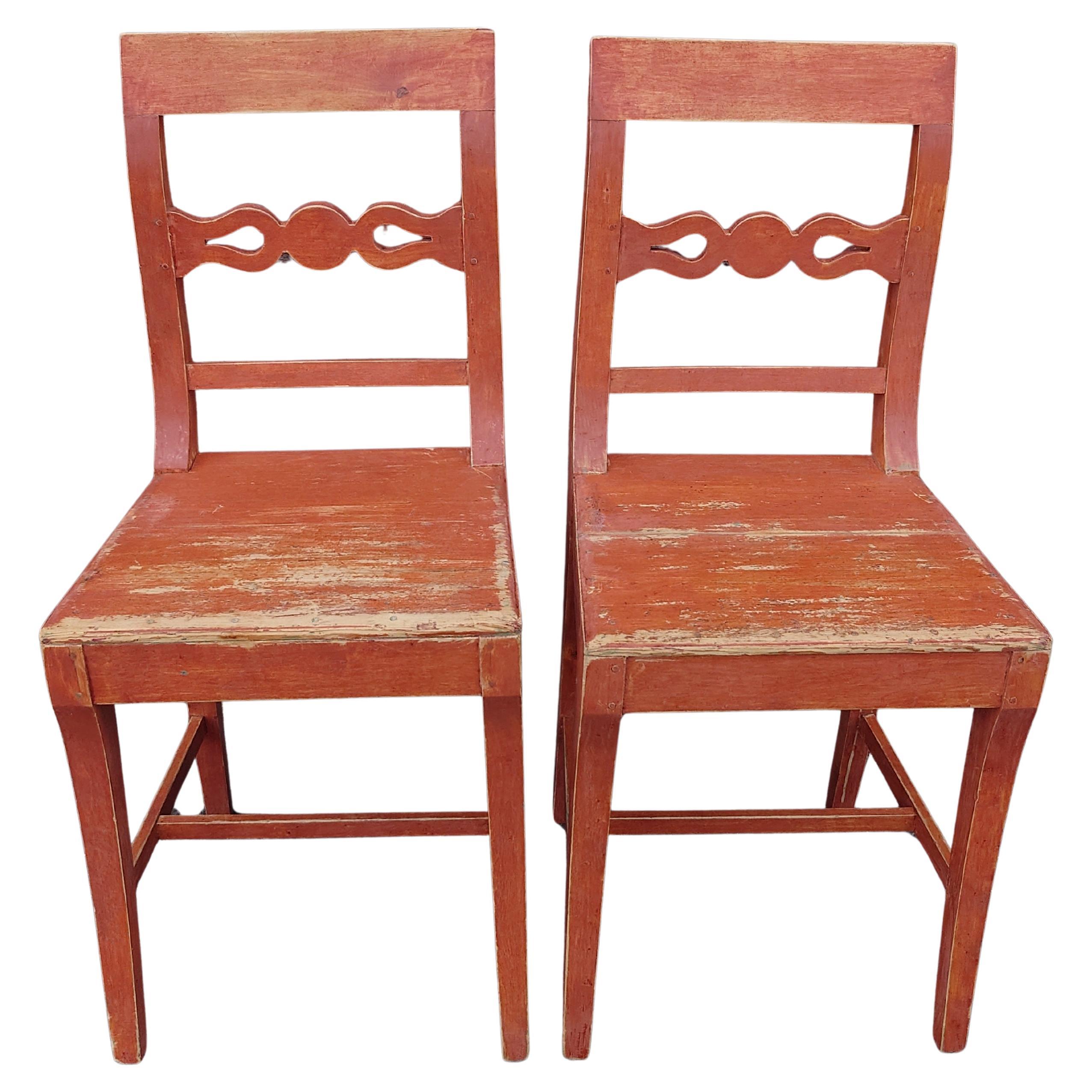 A pair of 19th Century Swedish Folk Art Empire chairs with original paint