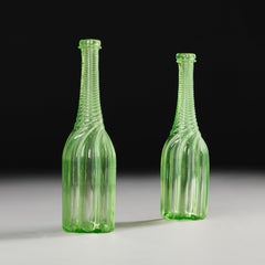 A Pair of 19th Century Victorian Green Uranium Glass Decanting Bottles