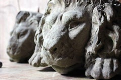 Pair of Carved Stone Gate Pier Fragmentary Lion Head Carvings, circa 1860