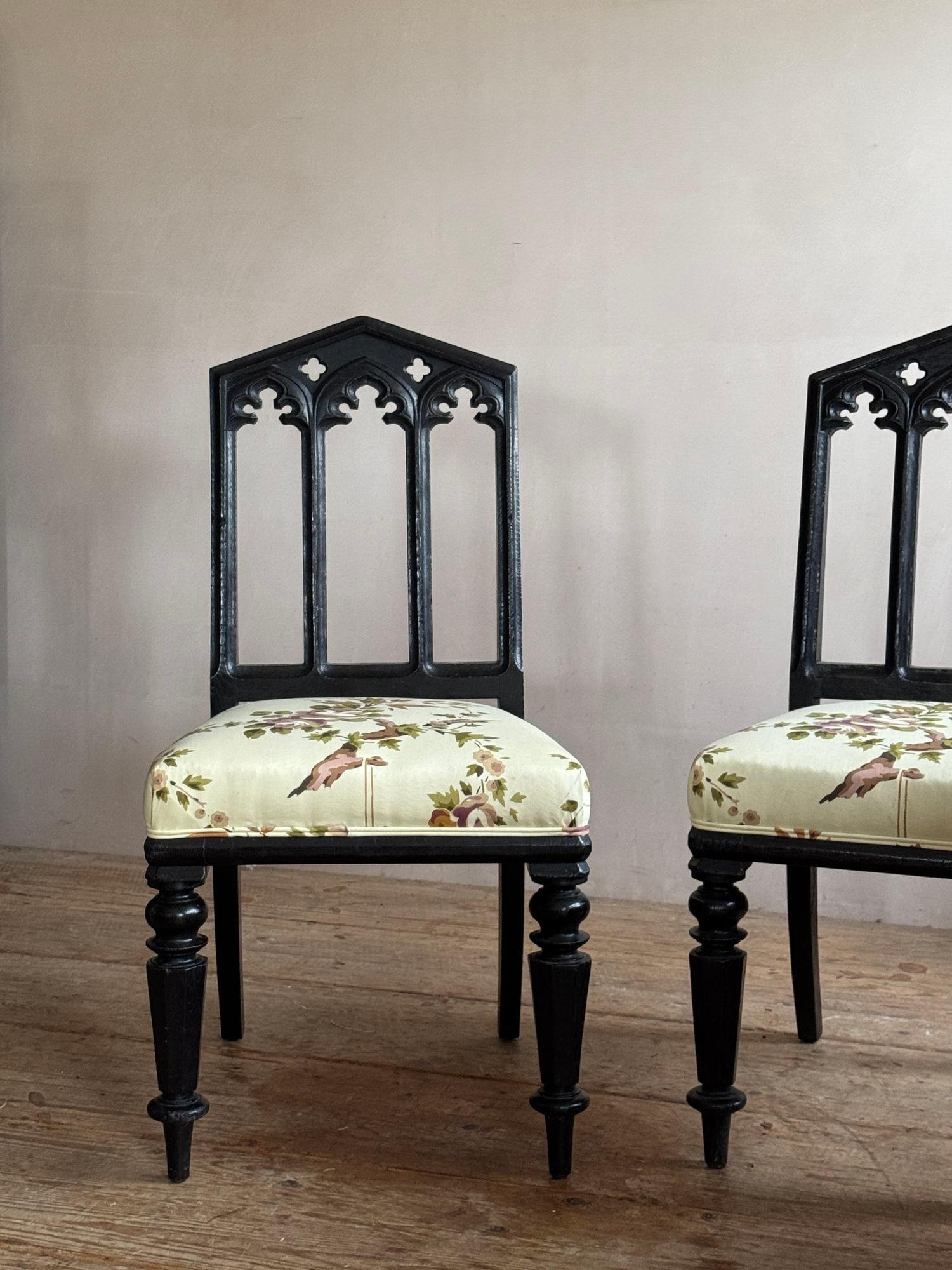 Oak A pair of 19thC ebonised oak gothic revival chairs