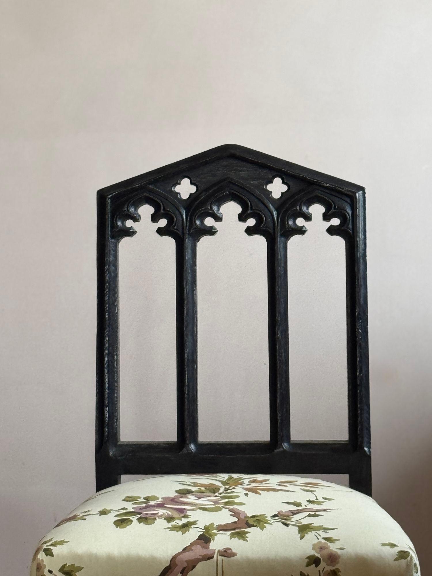 A pair of 19thC ebonised oak gothic revival chairs 1