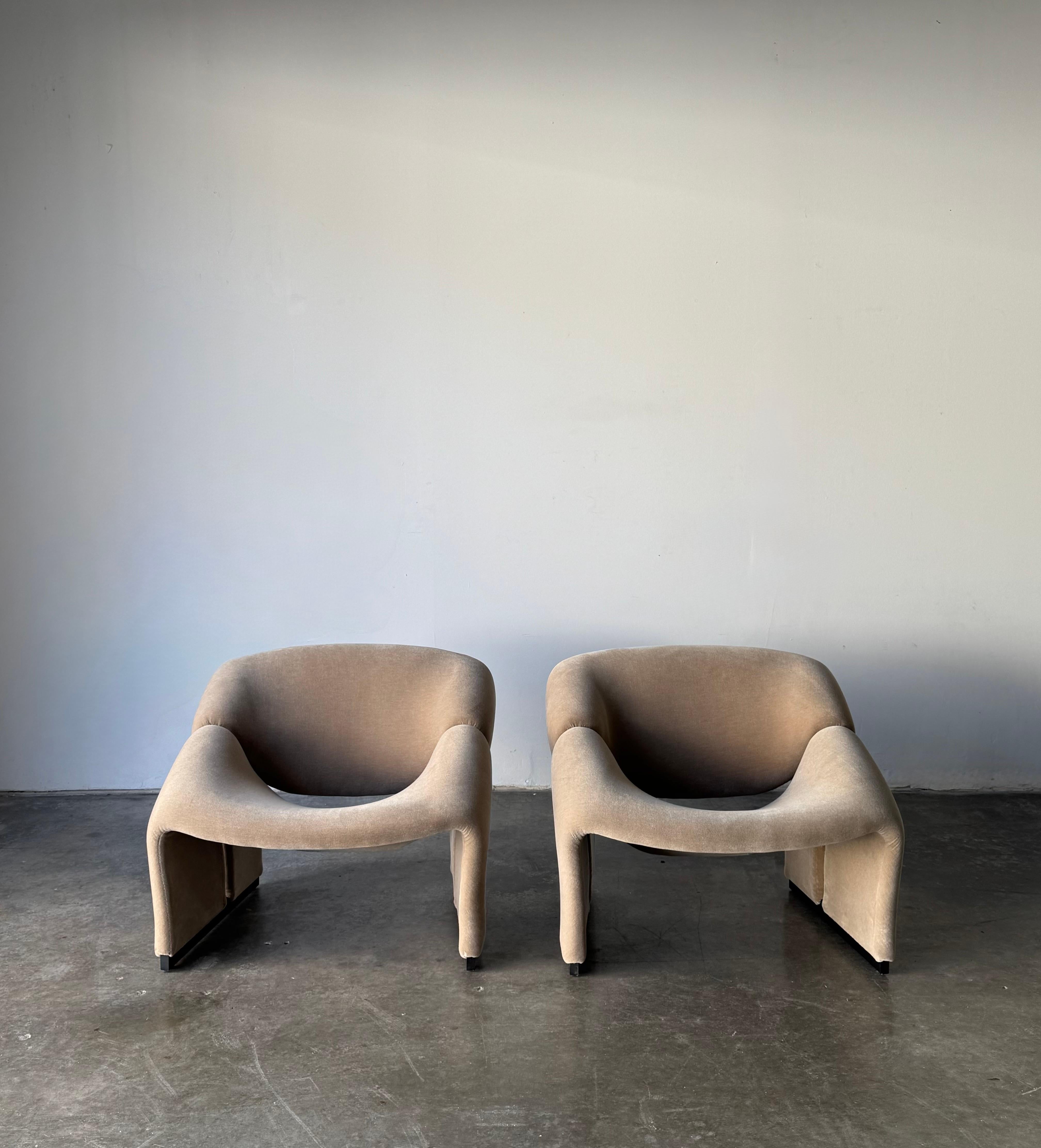 These iconic groovy chairs are designed  by Pierre Paulin for Artifort in 1966. Known for their sculptural shape, they sit extremely comfortably and hug the body. These have been fully redone with new foam and bases have been refinished matte black.