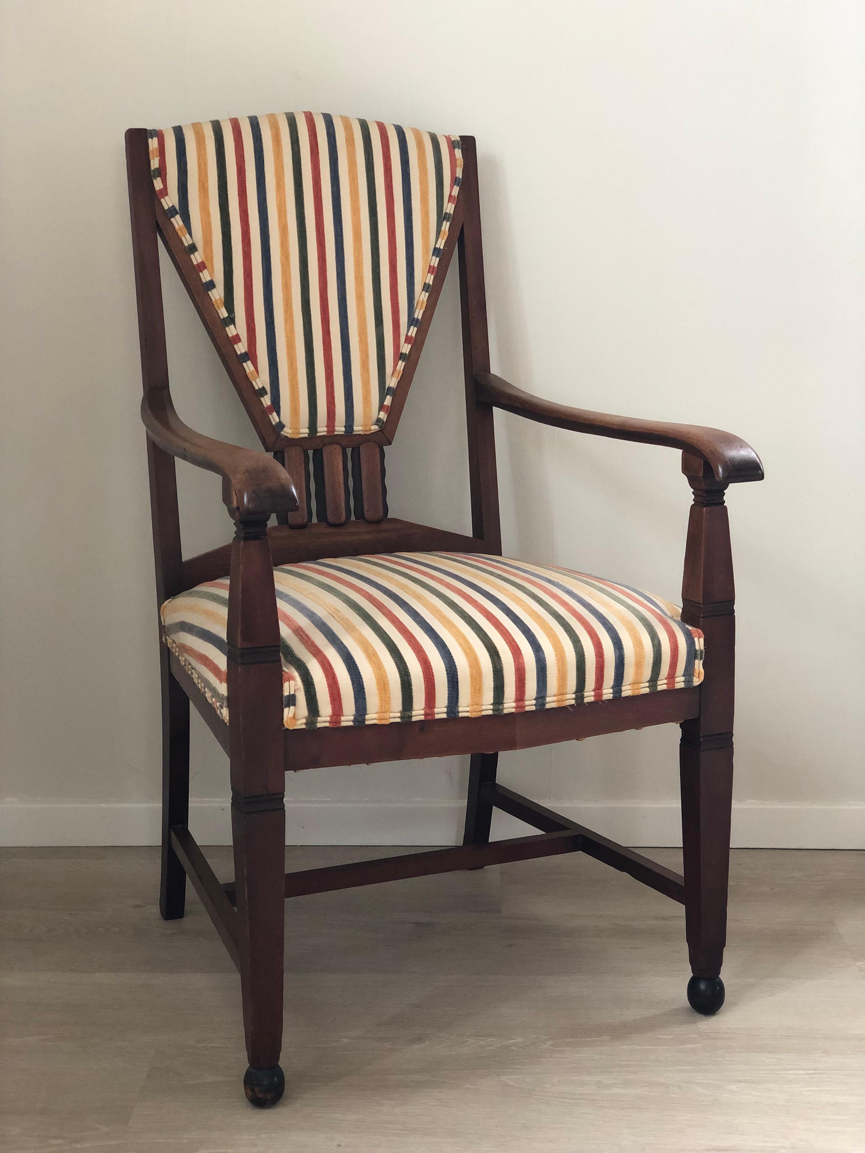 A unique Art Deco set of Amsterdam school armchairs of high quality craftsmanship from the Netherlands, 1930s. The large armchairs were designed and made by furniture manufacturer 't Woonhuys from Amsterdam. Detailed chairs with unique shapes in
