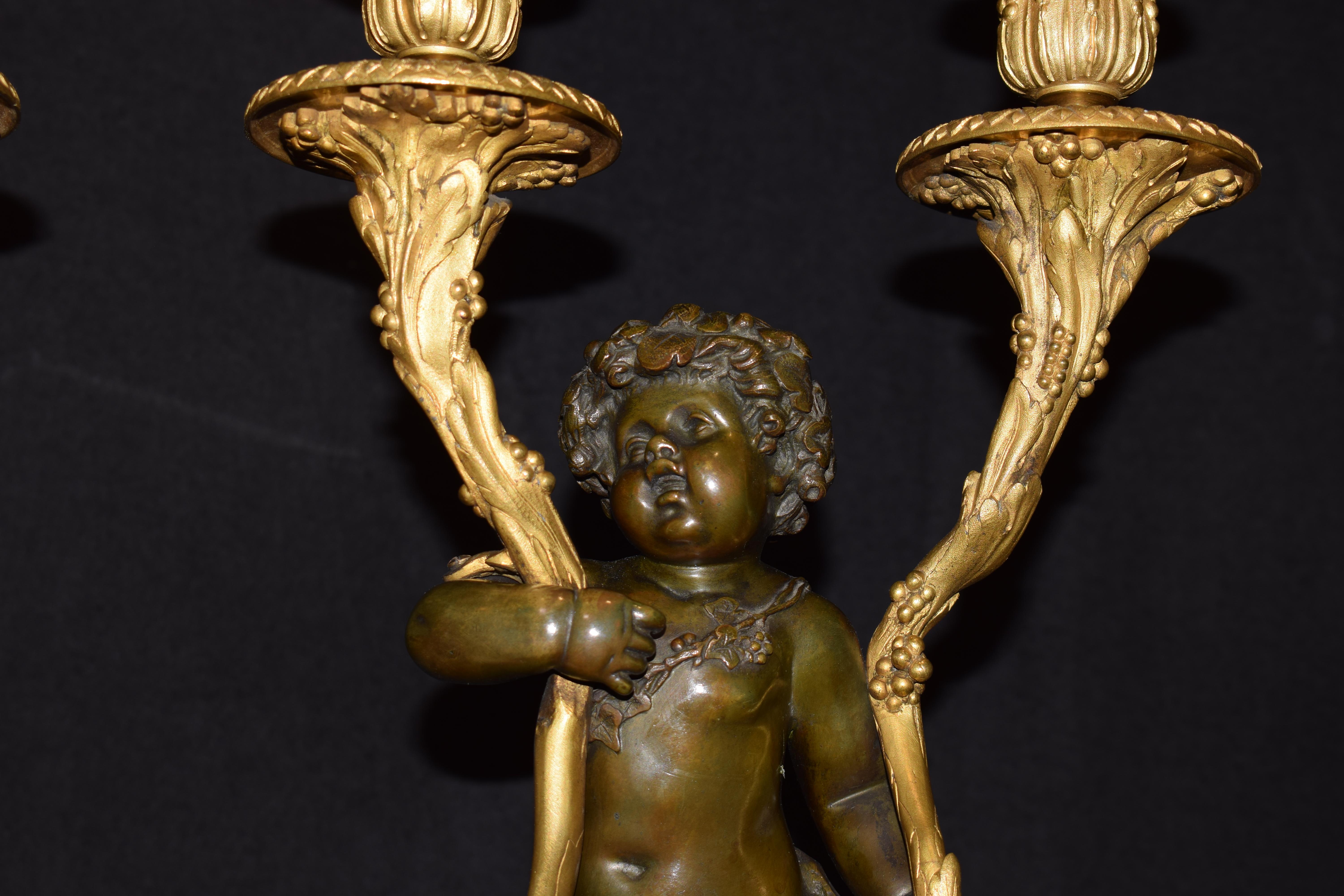 Pair of 2 Light Candelabra with Children In Good Condition For Sale In Atlanta, GA