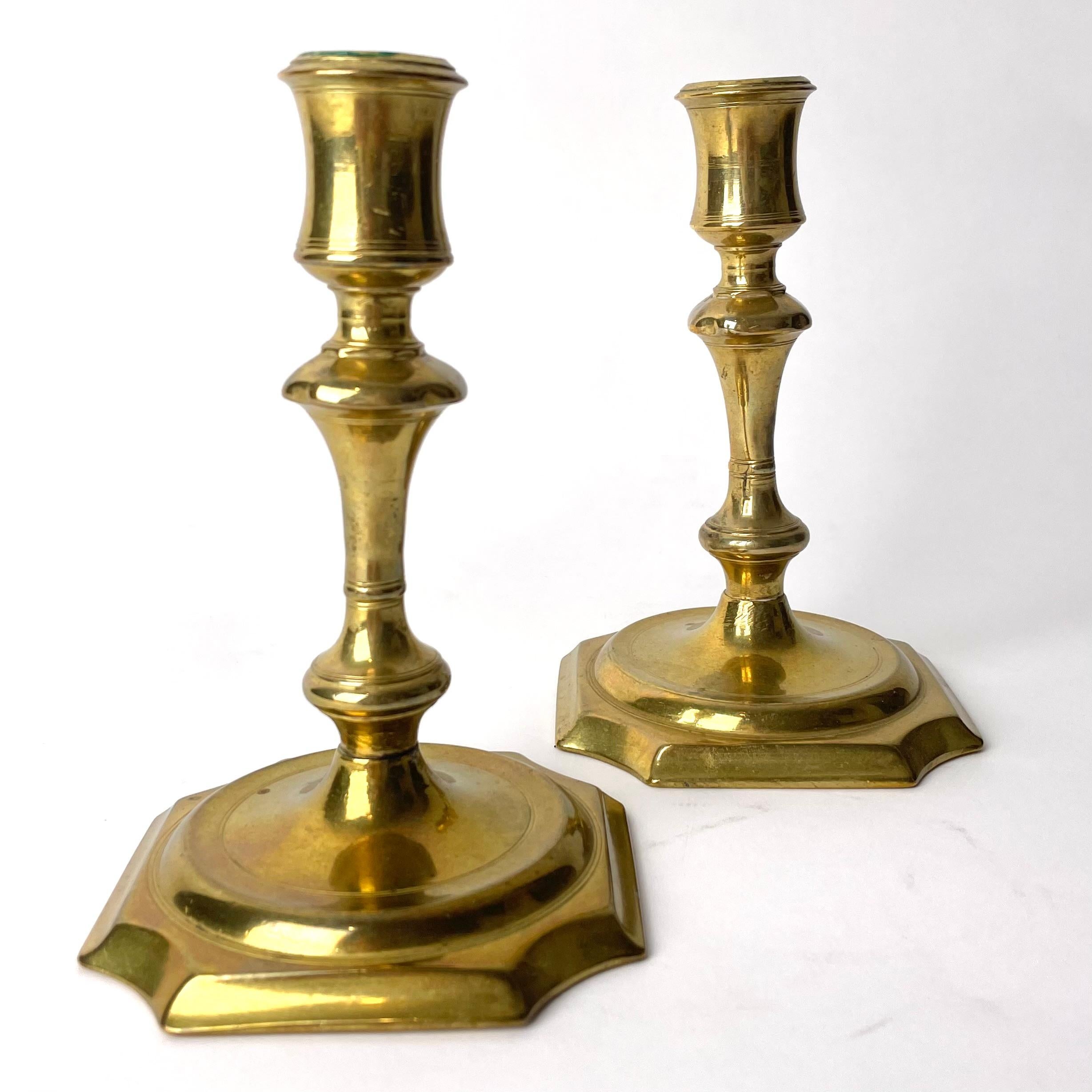A Pair of 2 Lovely Brass Candlesticks, Late Baroque, Early 18th Century

A charming pair of Late Baroque Candlesticks in a beautifully rich brass. Typical Late Baroque ornamentation with heavy focus on form, letting the materials shine in