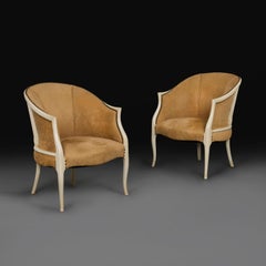 A Pair of 20th Century Art Deco Tan Suede Tub chairs