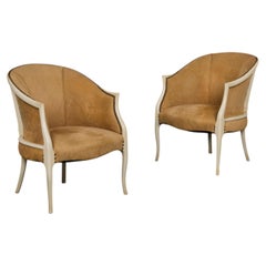 A Pair of 20th Century Art Deco Tan Suede Tub chairs