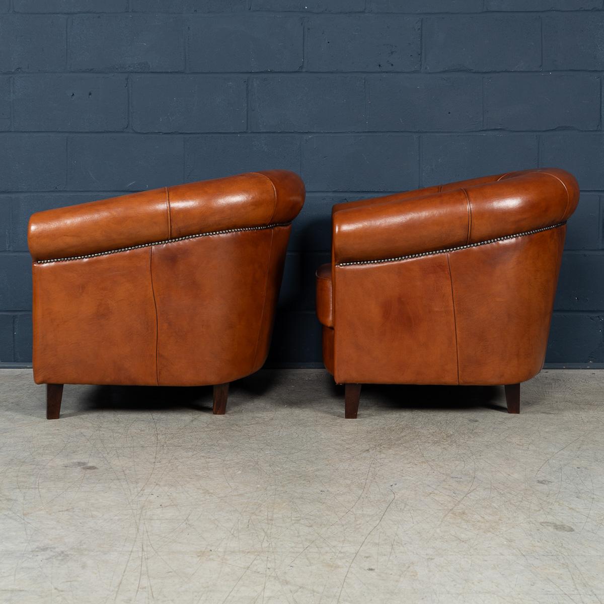 A Pair Of 20th Century Dutch Sheepskin Leather Club Chairs In Good Condition For Sale In Royal Tunbridge Wells, Kent