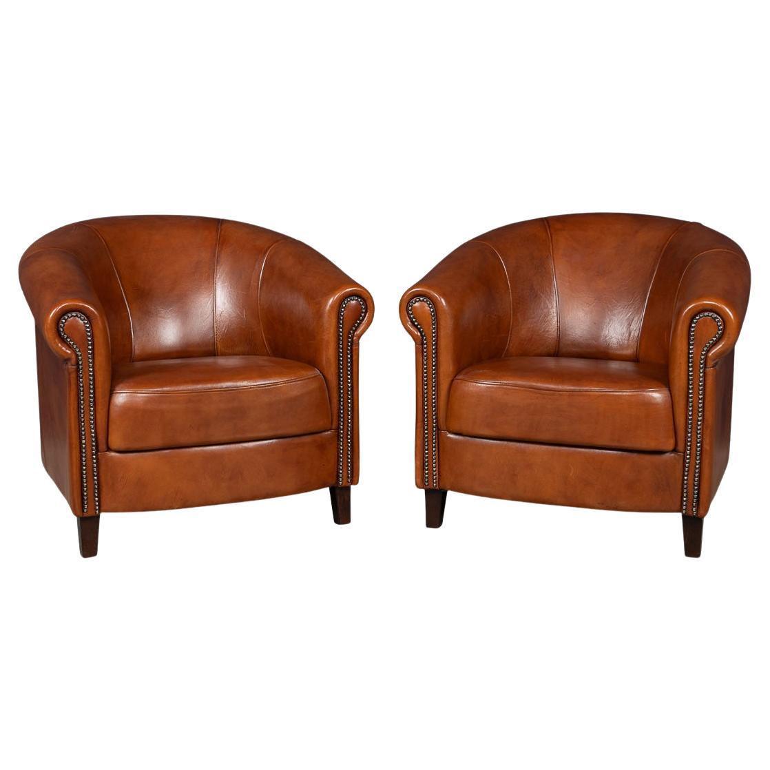 A Pair Of 20th Century Dutch Sheepskin Leather Club Chairs For Sale