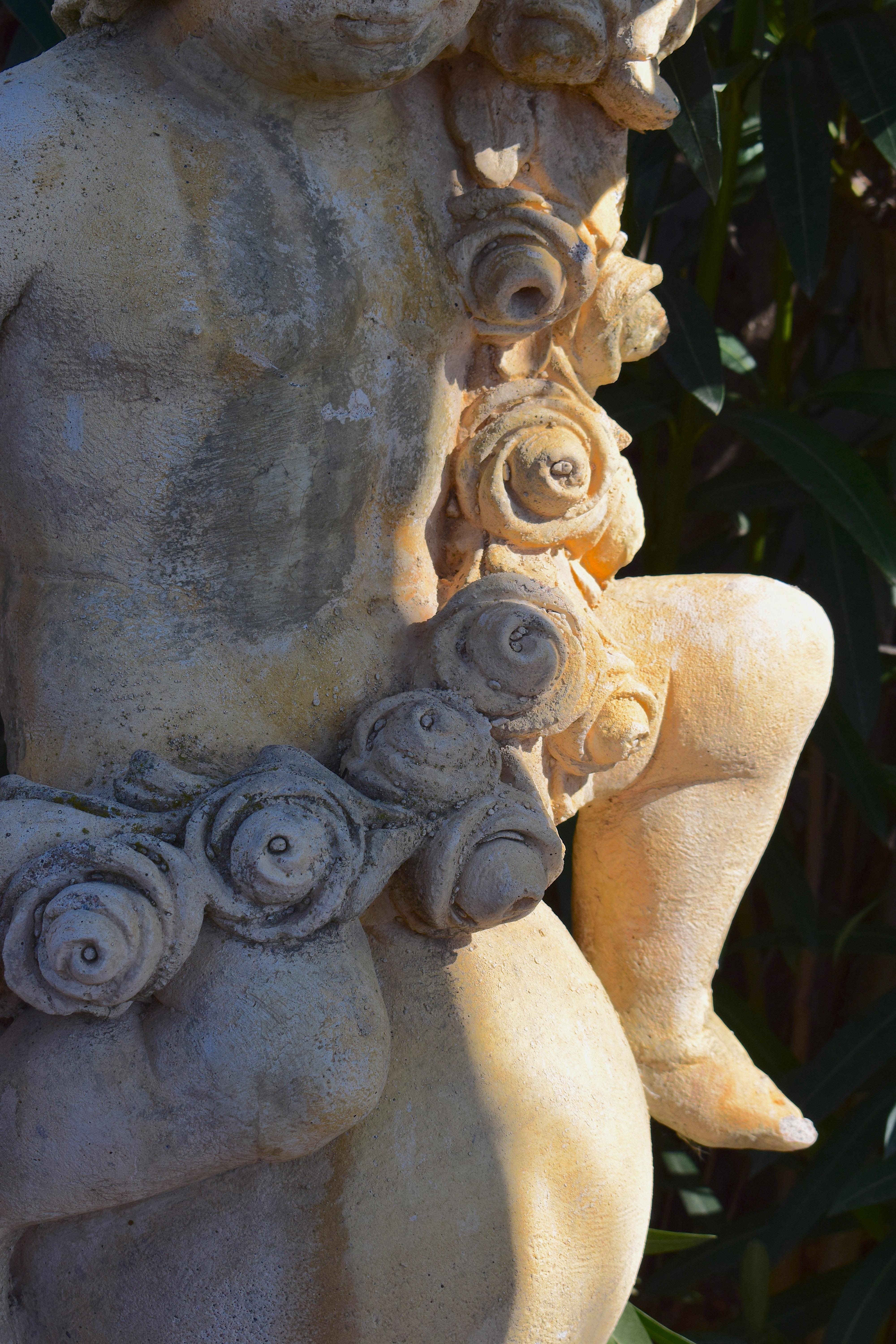 Pair of 20th Century Garden Cherubs on Square Plinths For Sale 4