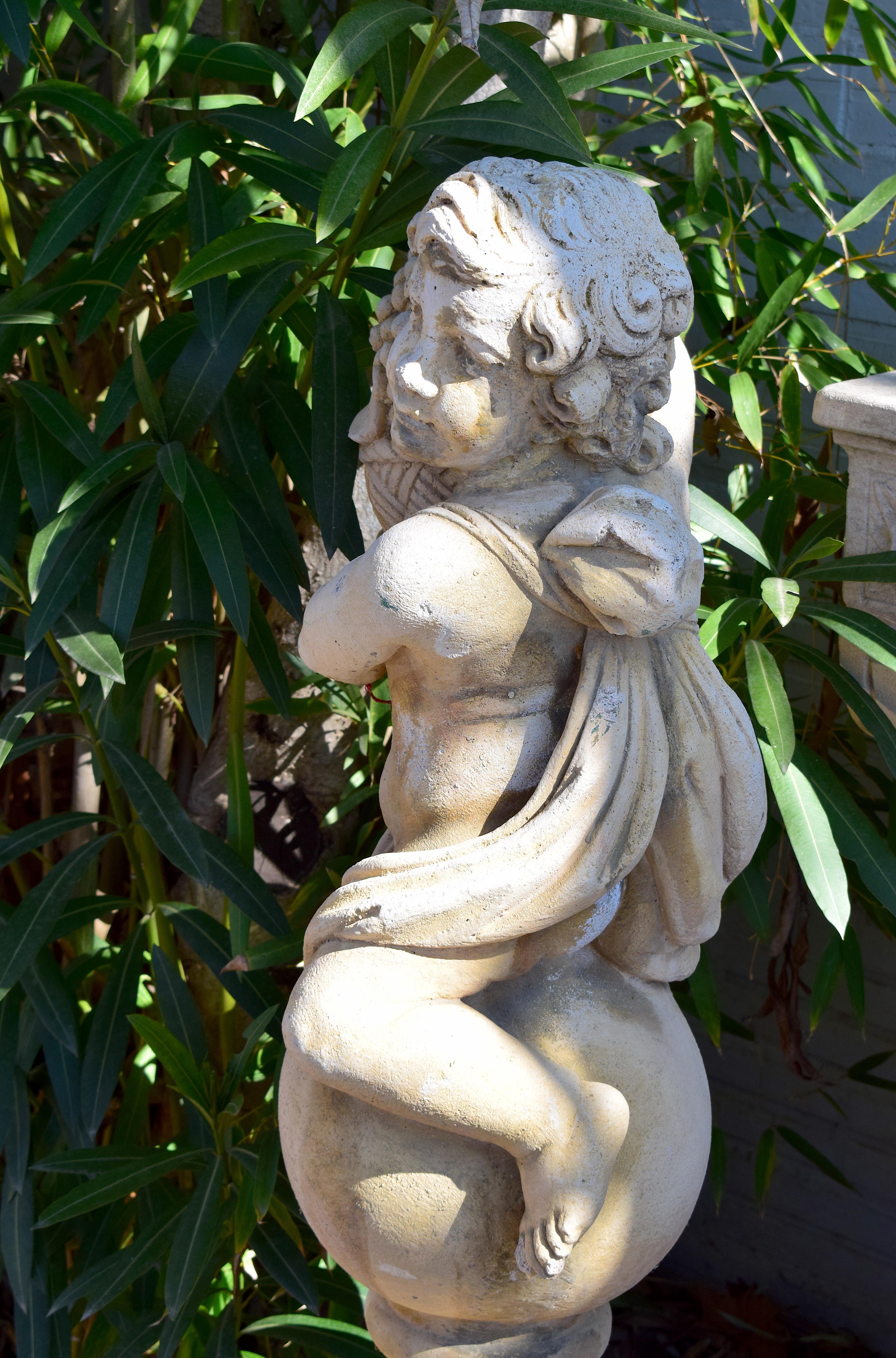 Pair of 20th Century Garden Cherubs on Square Plinths For Sale 11