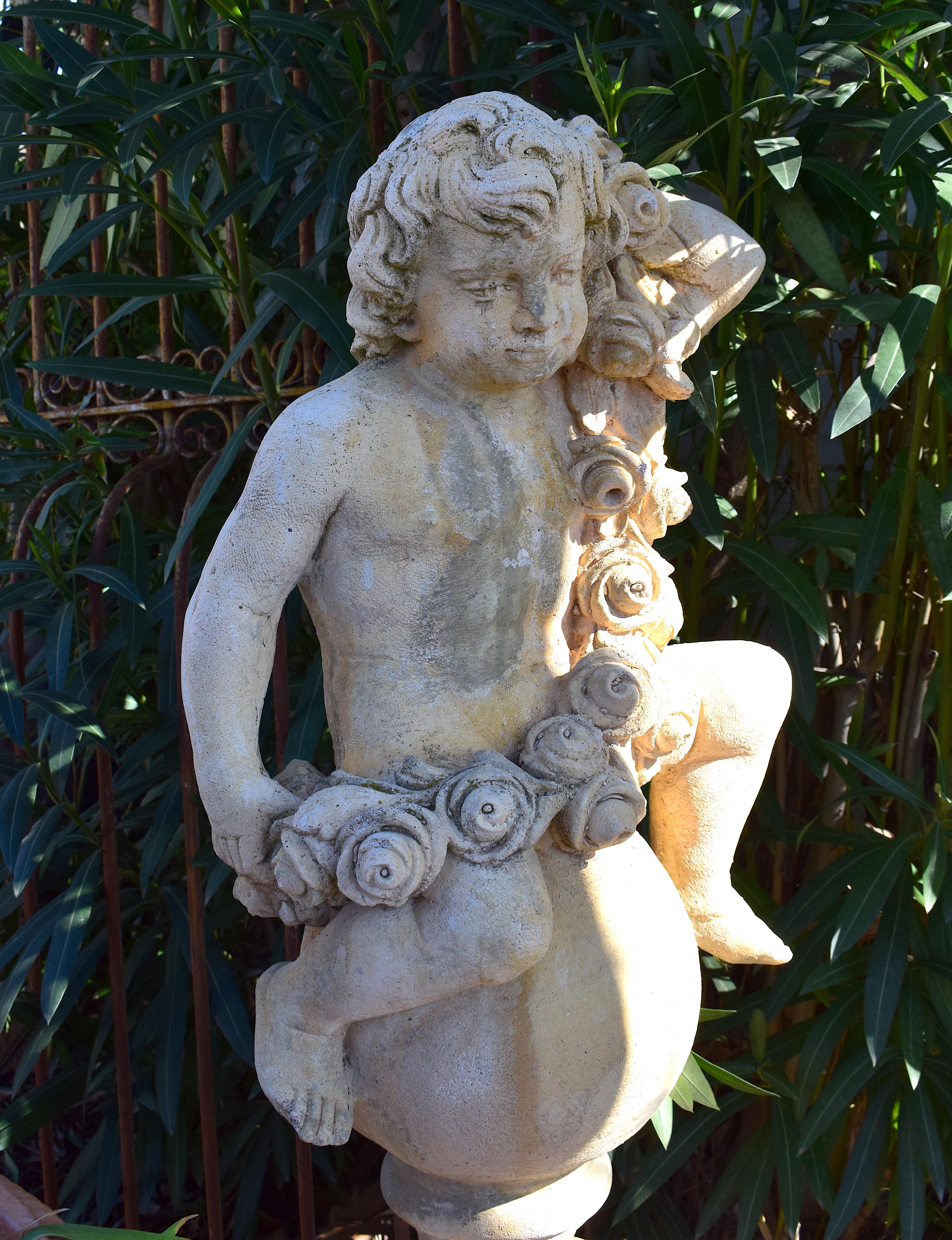 Pair of 20th Century Garden Cherubs on Square Plinths For Sale 2