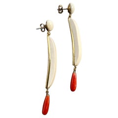 A pair of 21st Century Bone and Mediterranean Coral Earrings by Carola