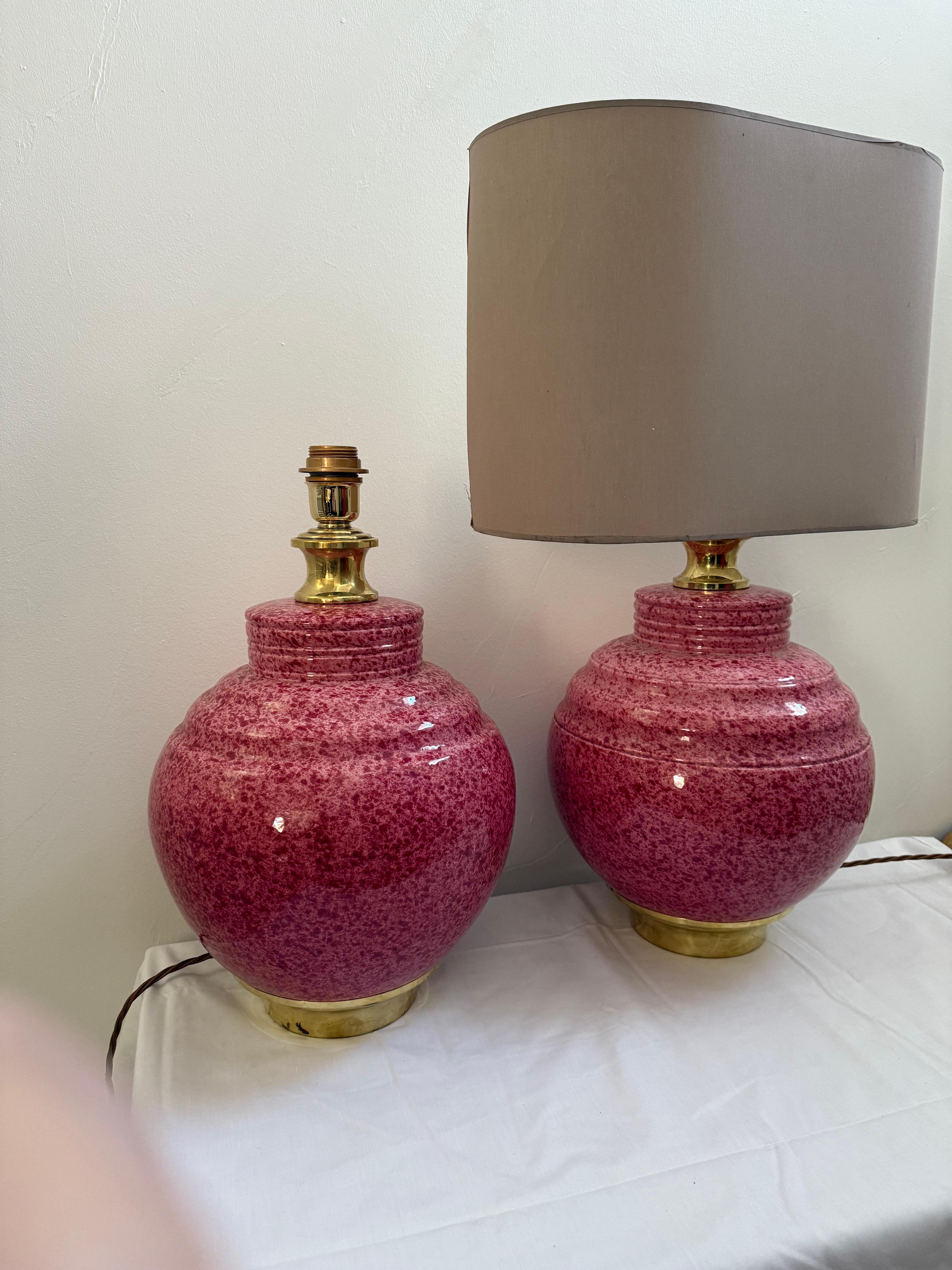 A pair of large glazed pink patinated table lamps attributed to Tommaso Barbi, Italy c.1970's, wired to UK standards, lamp shades not included