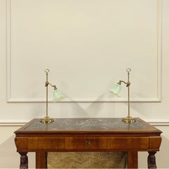 A Pair of Adjustable Brass Lamps