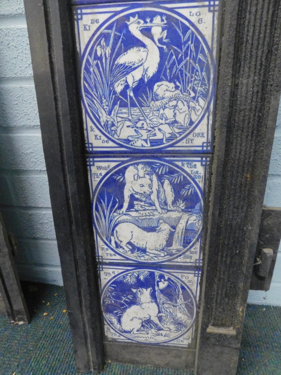 Ceramic Pair of Aesthetic Movement Cast Fire Inserts with Mintons Aesop's Fables Tiles For Sale