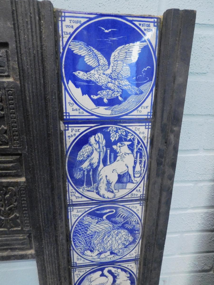 English Pair of Aesthetic Movement Cast Fire Inserts with Mintons Aesop's Fables Tiles For Sale