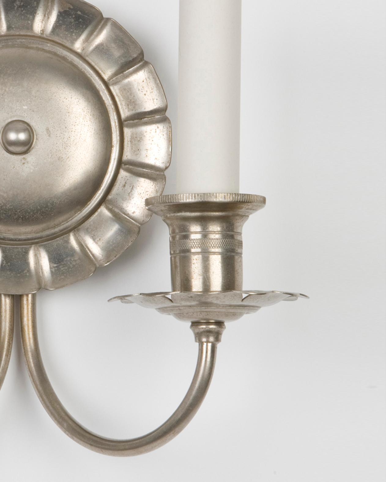 American A Pair Of Two Arm Aged Nickel Sconces with Pie-Crust Edge Backplates