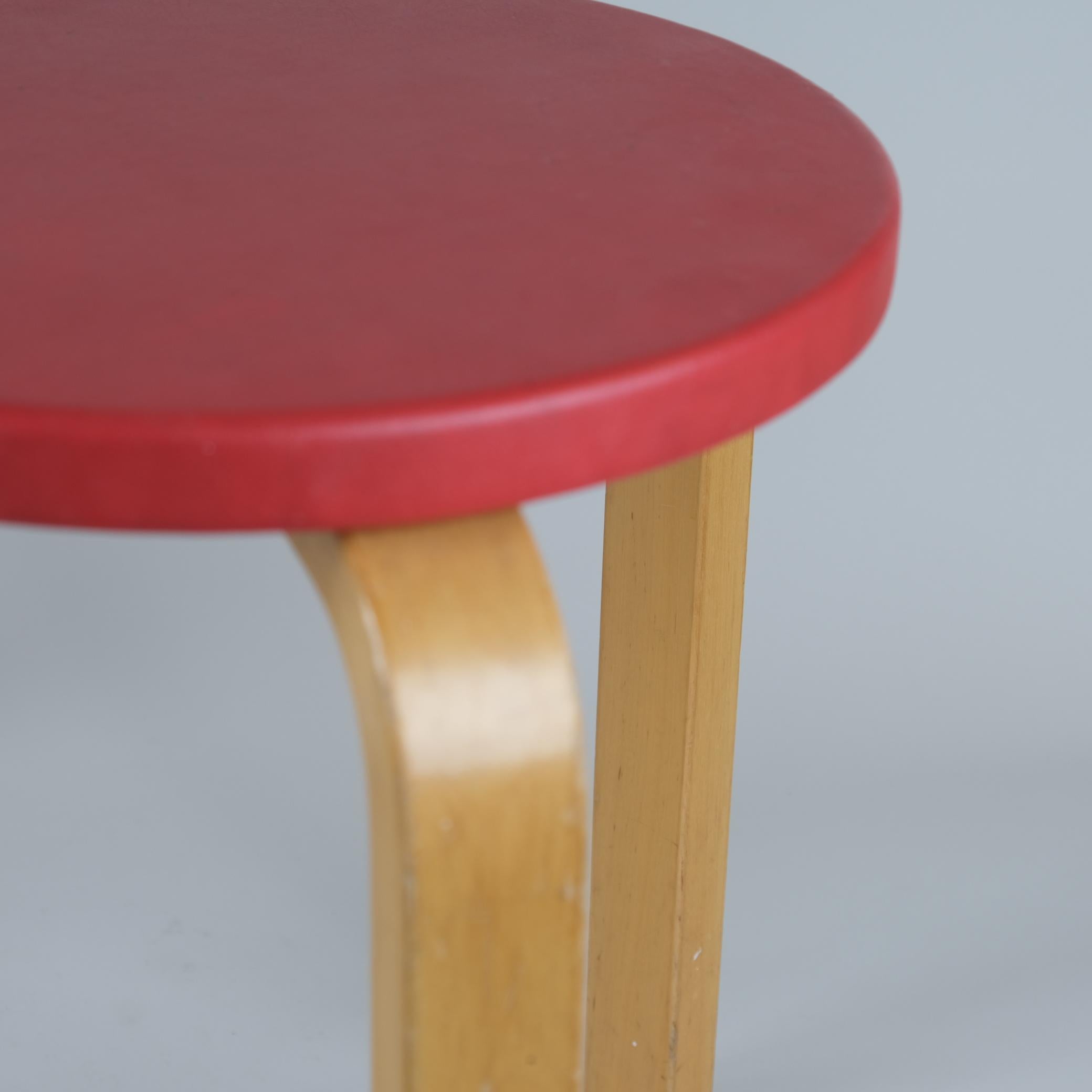 Finnish A Pair of Alvar Aalto Stools Model 60, Red Pegamoid Upholstery, Artek 1950s For Sale