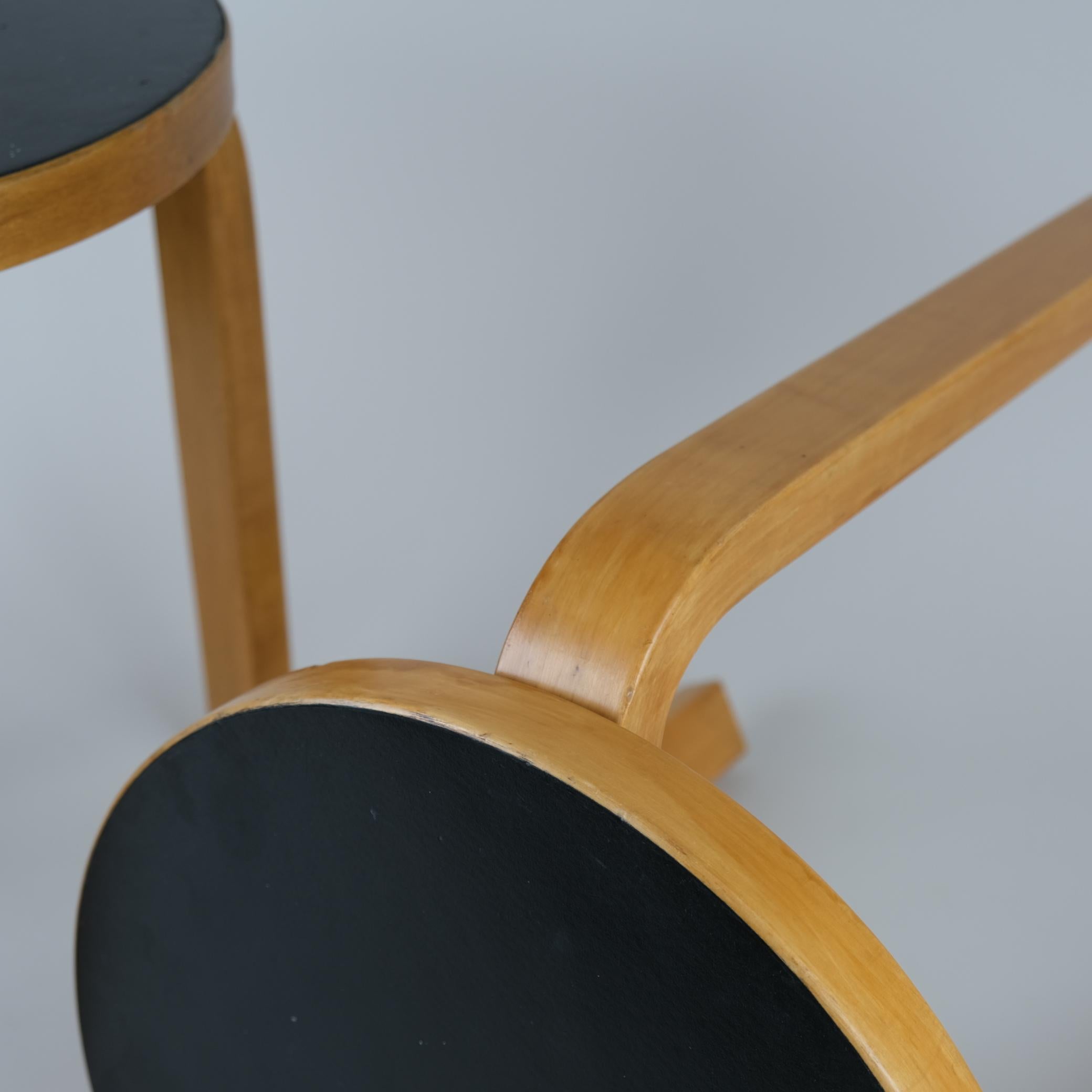 A Pair of Alvar Aalto Stools Model no 60, Black Laminate, Artek 1950s In Good Condition For Sale In Helsinki, FI