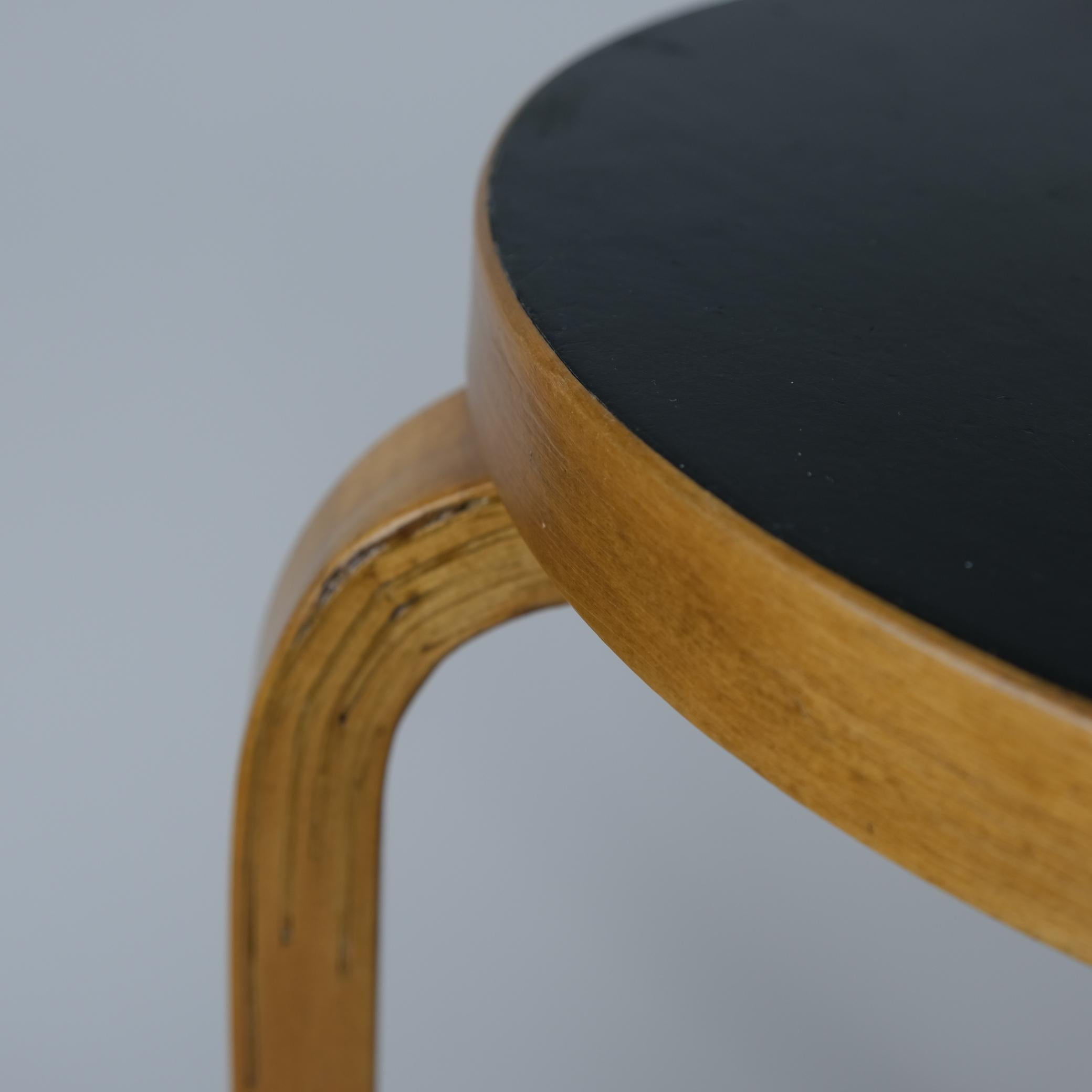 Fabric A Pair of Alvar Aalto Stools Model no 60, Black Laminate, Artek 1950s For Sale