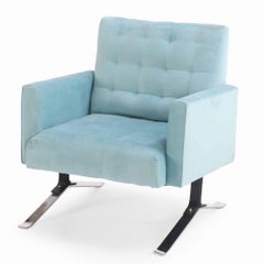 A pair of American chromed iron lounge chairs, C. 1970.