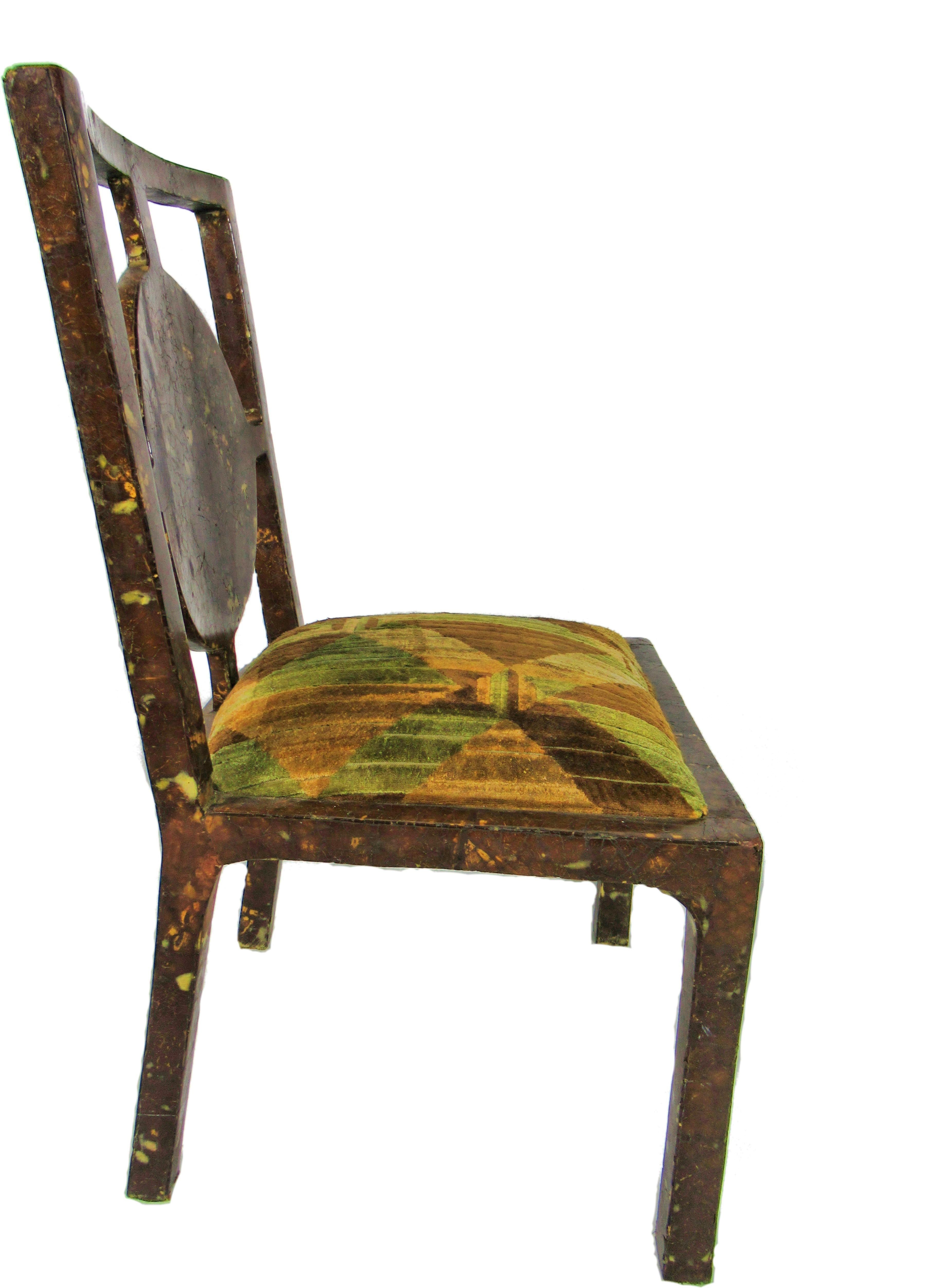 the frame overall in coconut veneer, the square slightly curved back with circular center, on square parsons legs.