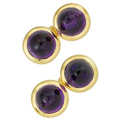 A Pair Of Amethyst And Yellow Gold Cufflinks