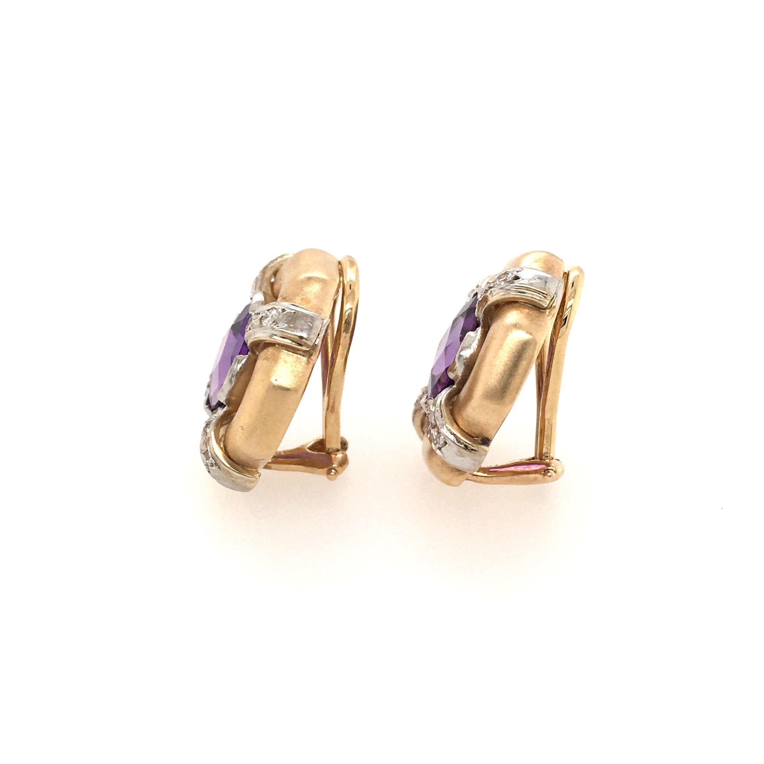 A pair of 14 karat yellow gold, amethyst and diamond earrings. Designed as a matte gold square plaque, centering a square cut amethyst, enhanced by pave set diamond detail. Length is approximately 3/4 inches, gross weight is approximately 11.6