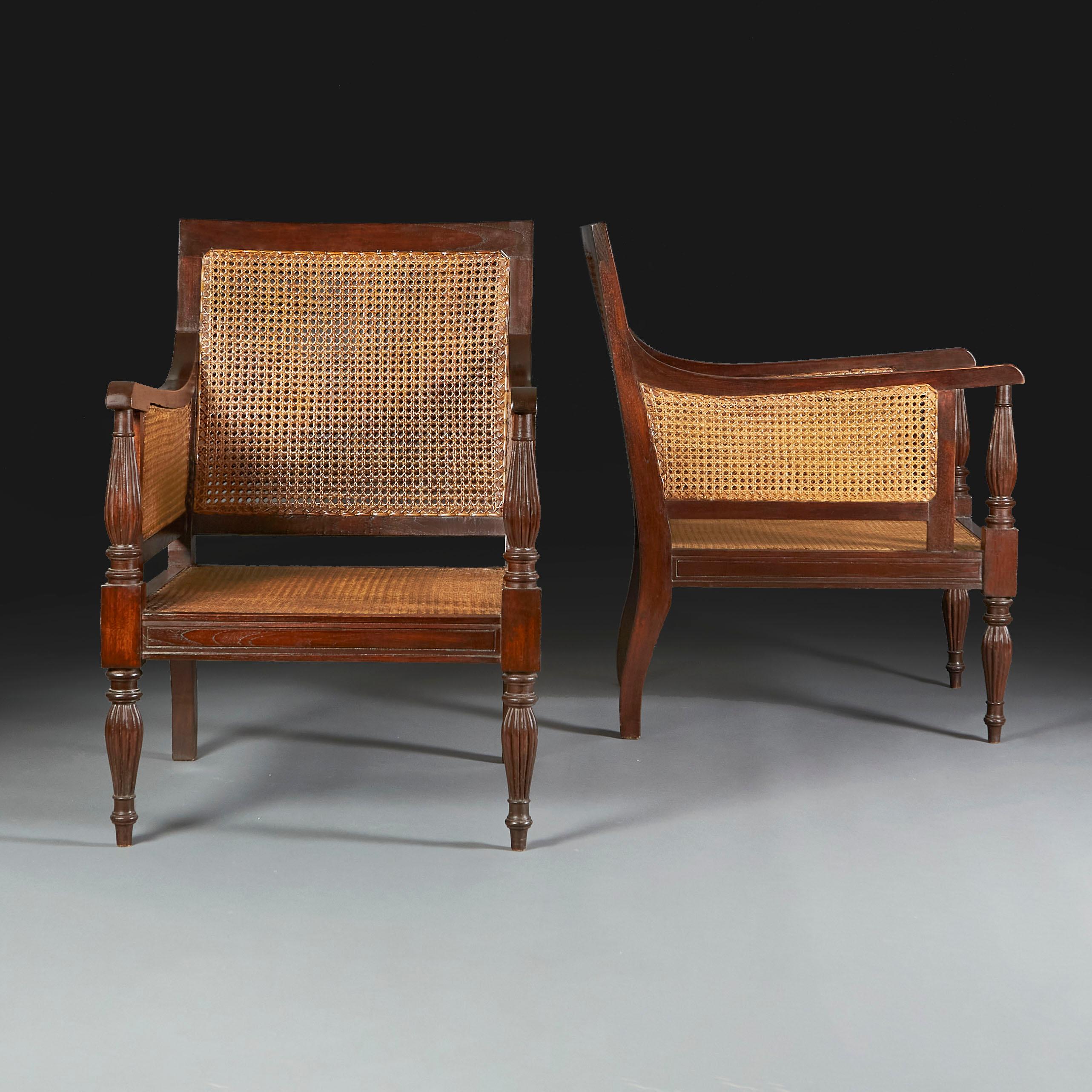 Hardwood Pair of Anglo Indian Regency Style Caned Bergeres