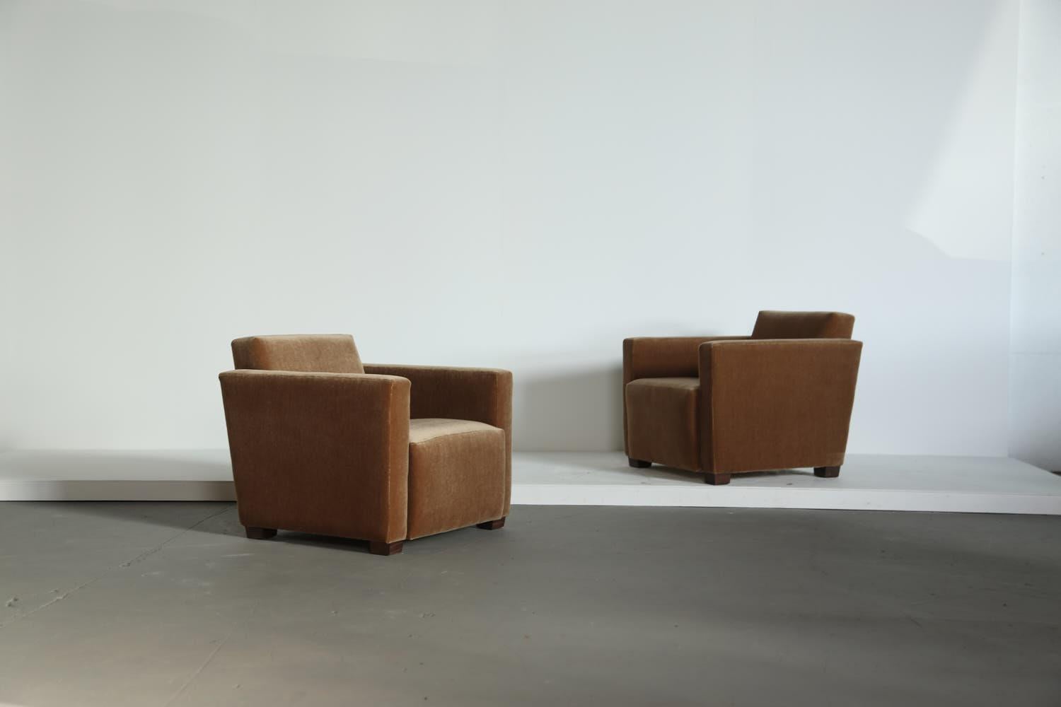 A superb pair of modern angular club armchairs.  High quality handmade beech frames and sprung seats.  Newly upholstered in a premium soft, pure mohair fabric. Fast shipping worldwide.



