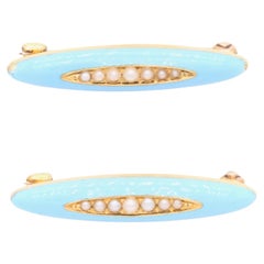 A Pair of Antique 14K Yellow Gold Pale Blue Enamel and Seed Pearl Brooches