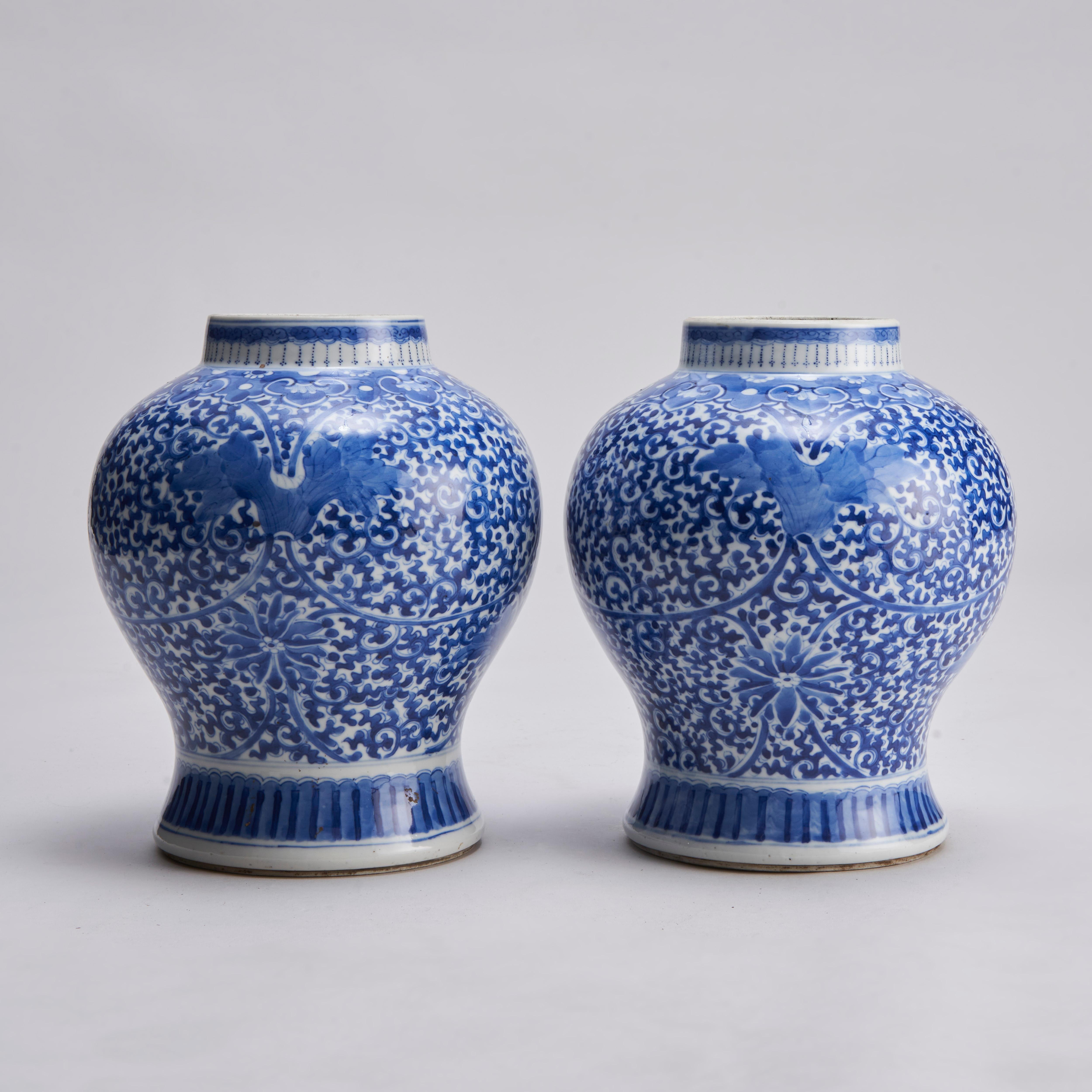 A pair of 19th century Chinese blue and white vases with a complex floral design depicting Clematis flowers on a dense foliate back gound. Ruyi head pattern to the shoulder of the vase.

Contact us for further information or to arrange a viewing.