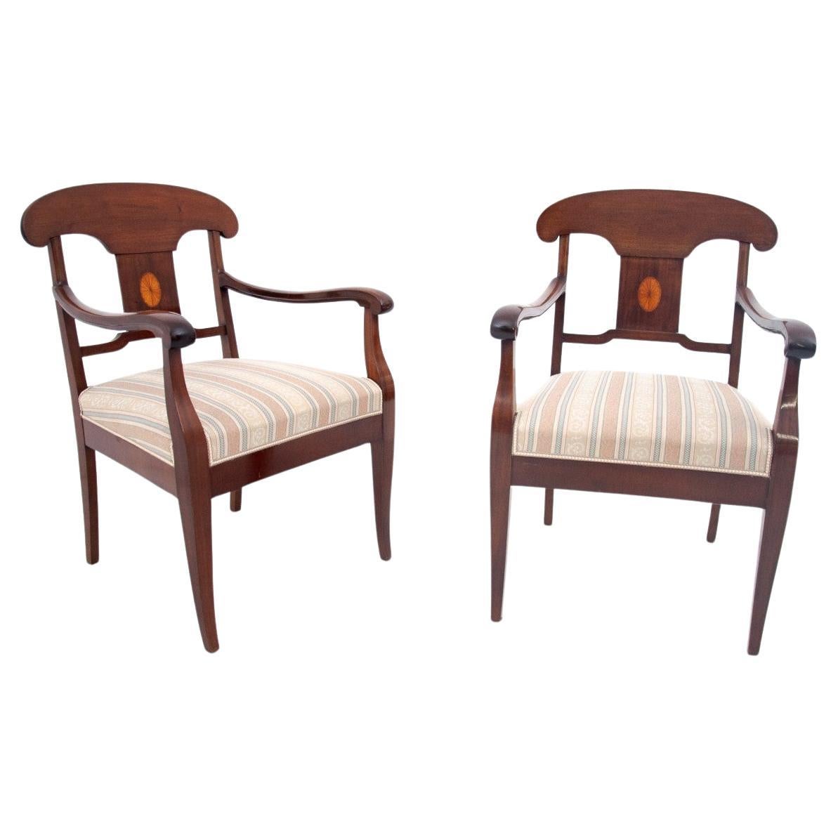 A pair of antique armchairs from around 1860, Northern Europe.