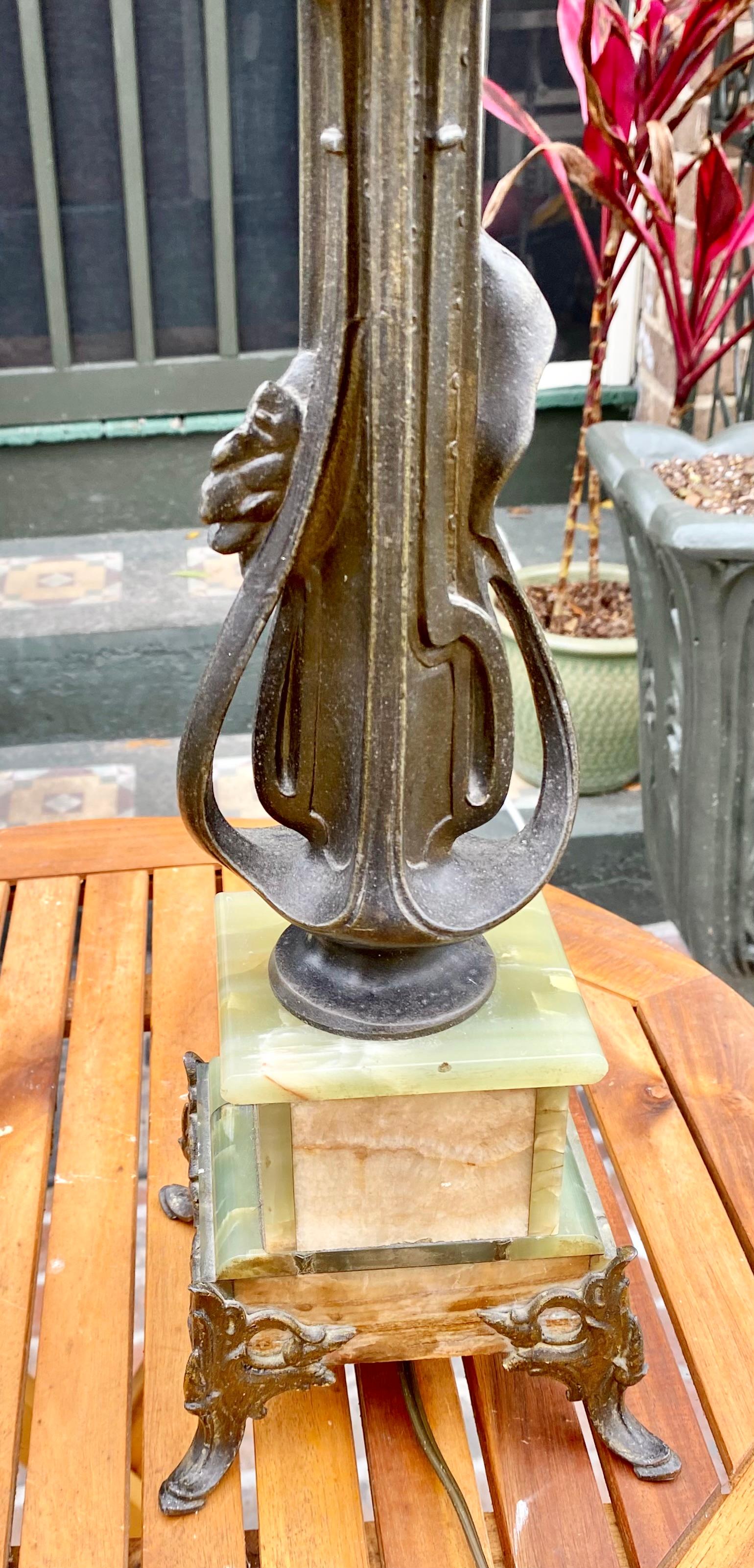 Metalwork A Pair of Antique Art Nouveau Onyx and Metal Lamps For Sale