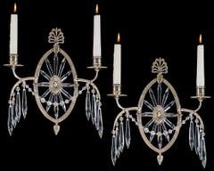 Paire d'appliques murales en laiton antique en forme de soleil