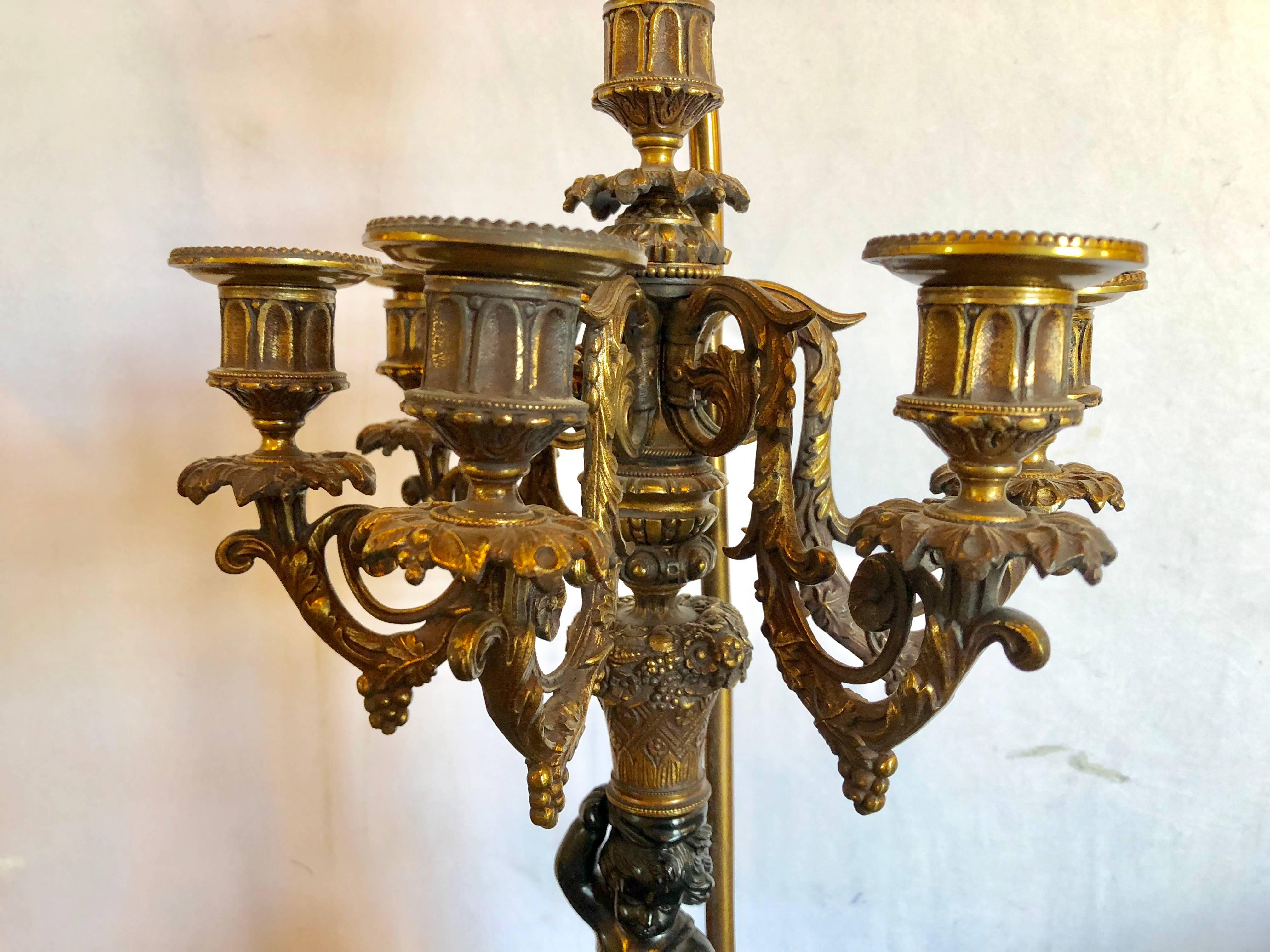 Belle Époque Pair of Antique Bronze Cherub Candelabras on Marble Vases with Custom Shades For Sale