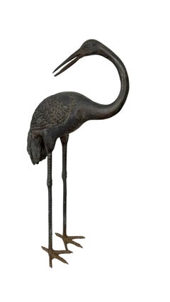 A Pair of Antique Bronze Crane Garden Sculptures